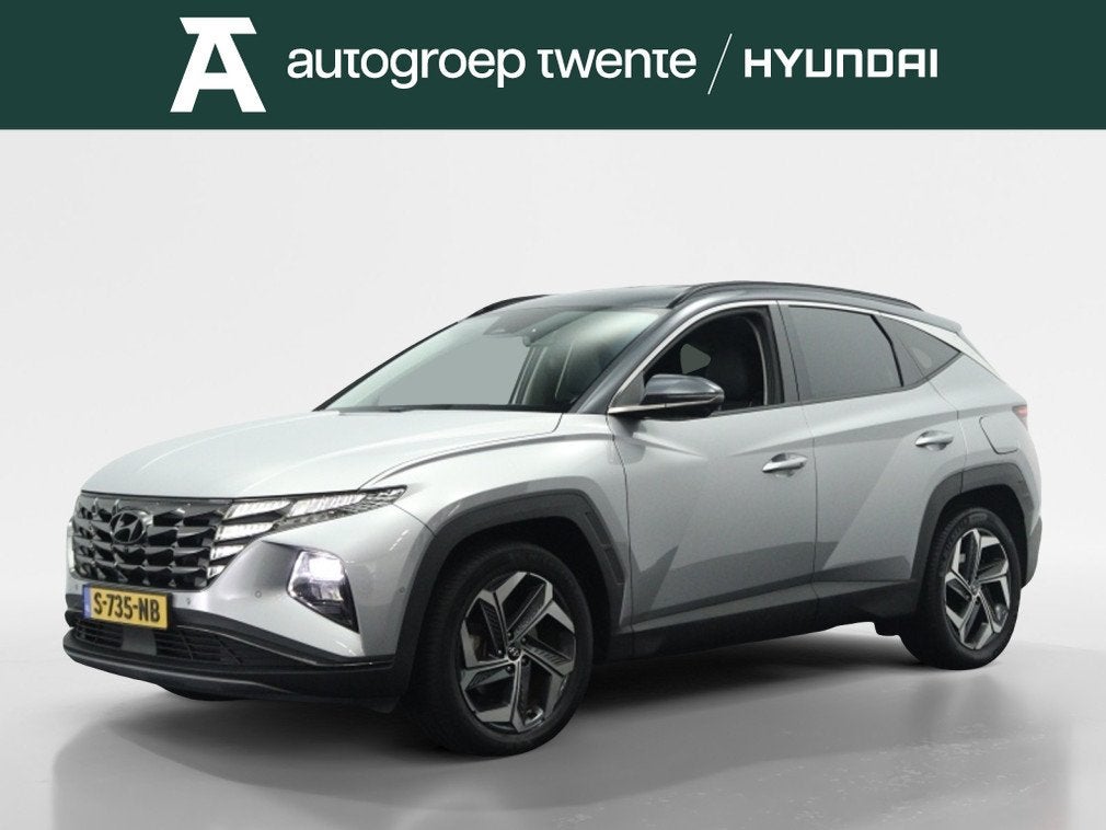 Hyundai Tucson 1.6 T-GDI HEV Premium | Leder | Navigatie | S, Auto's, Hyundai, 12 maanden, Gebruikt, 4 cilinders, 1650 kg