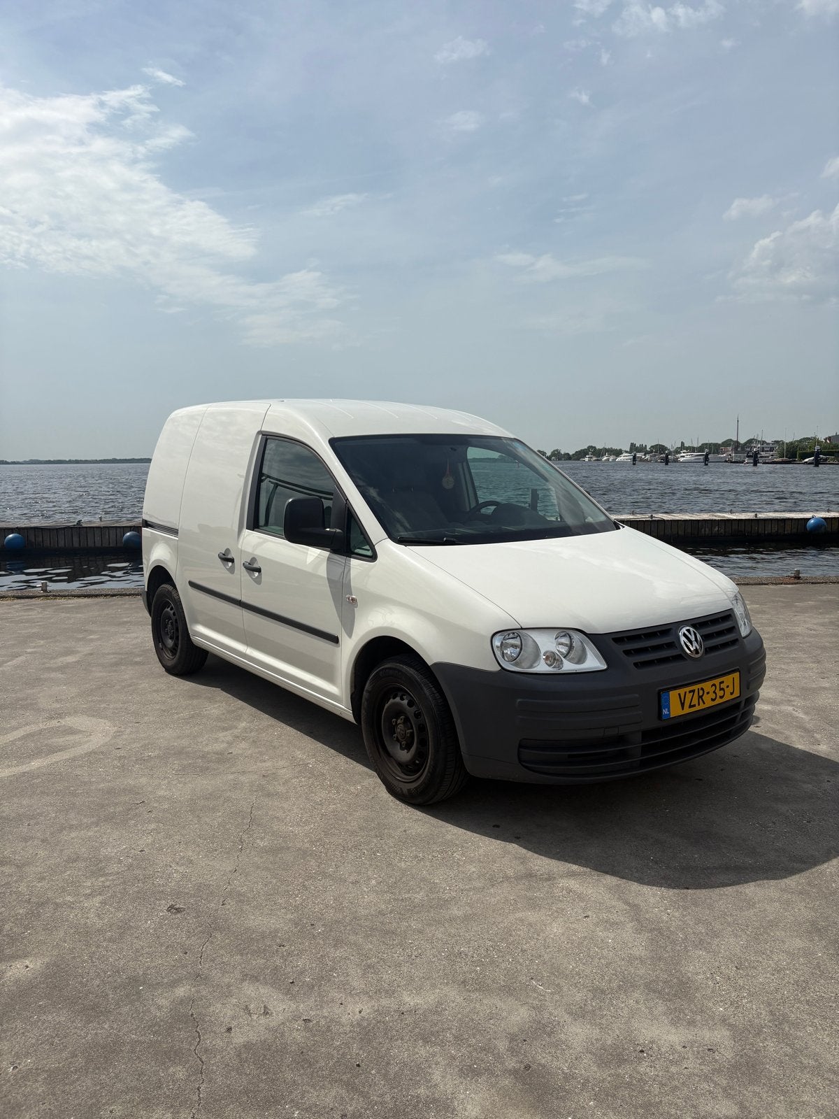 Benzine witte Volkwagen Caddy 1.6 2009 km stand: 90.000, Voorwielaandrijving, Volkswagen, Wit, Overige kleuren