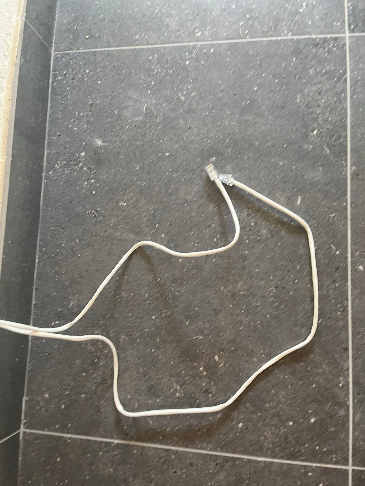 Witte internetkabel met RJ45-connectoren, Ophalen, Gebruikt