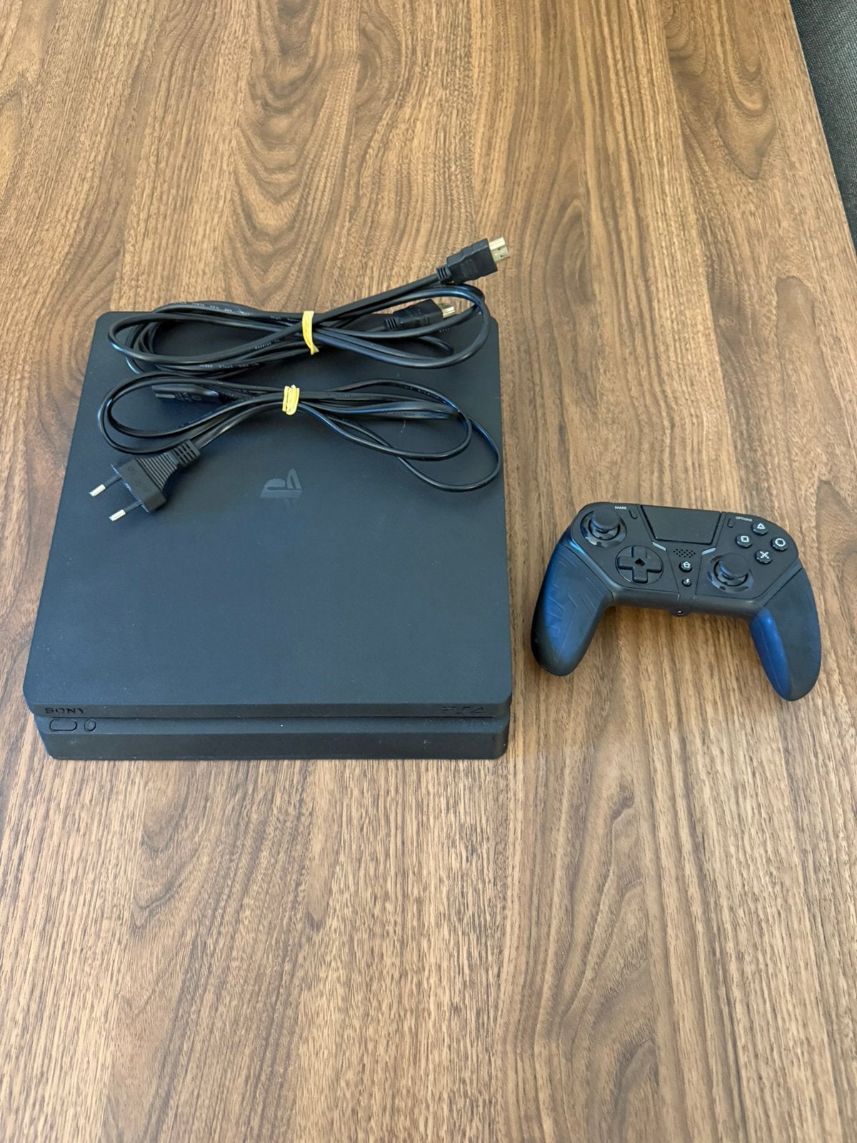 PlayStation 4 Slim 1TB + draadloze controller met paddles, Ophalen of Verzenden, Zo goed als nieuw, Met 1 controller, Slim