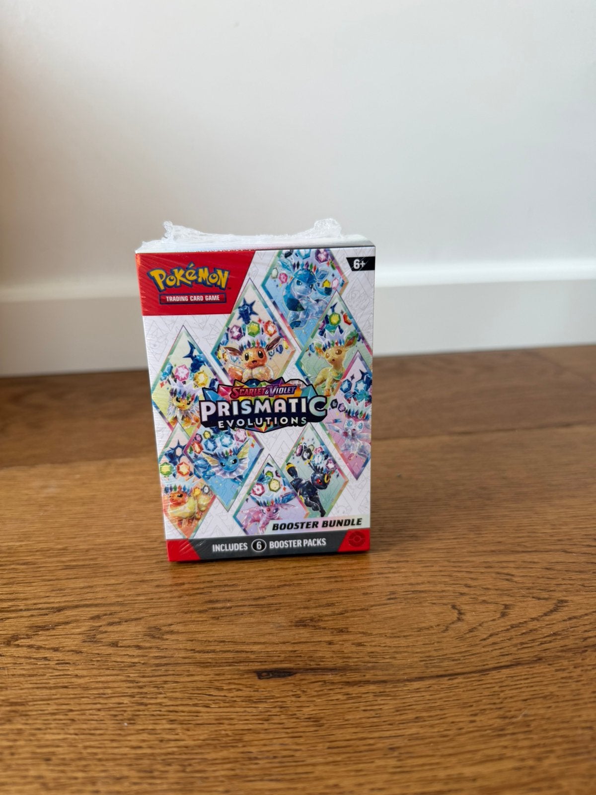 Prismatic evolutions booster bundle, Hobby en Vrije tijd, Verzamelkaartspellen | Pokémon, Ophalen, Zo goed als nieuw, Booster