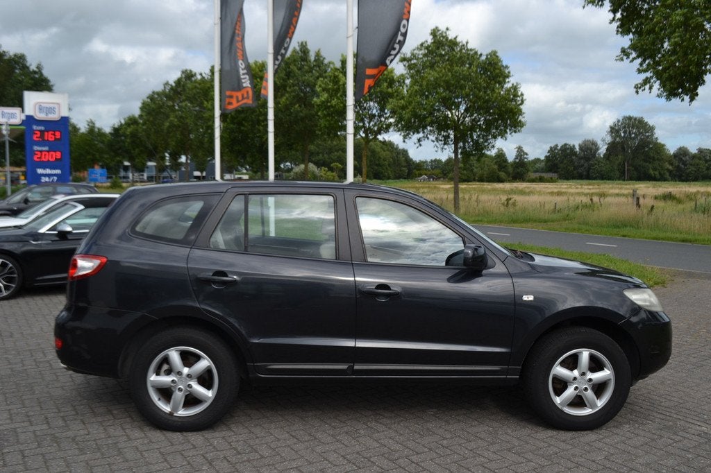 Hyundai Santa Fe 2.7i V6 Active Airco Trekhaak 2000 kg elekt, Auto's, Hyundai, Voorwielaandrijving, Gebruikt, 2000 kg, Zwart