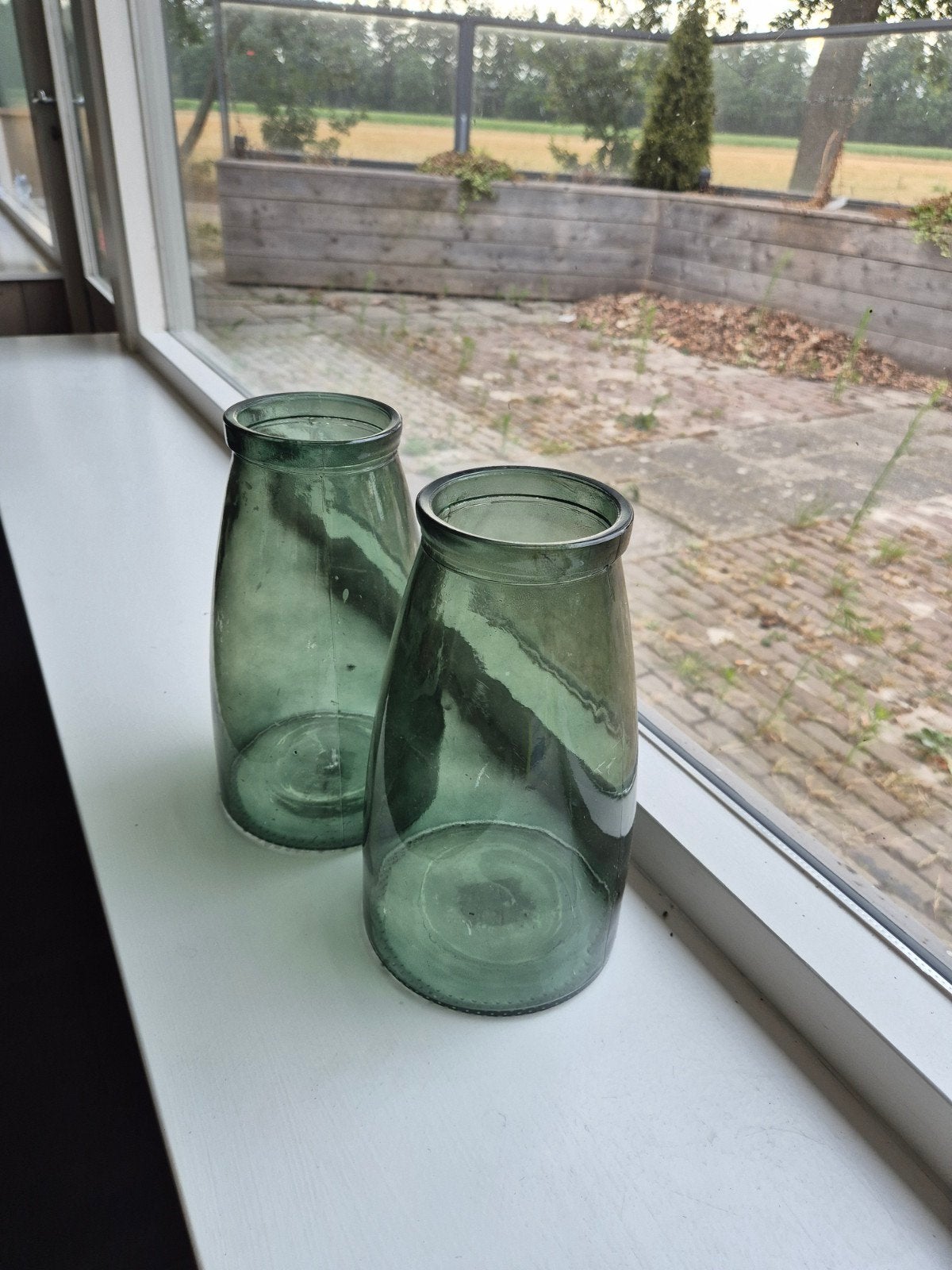 Set van 2 groene glazen vazen, Antiek en Kunst, Antiek | Vazen, Ophalen