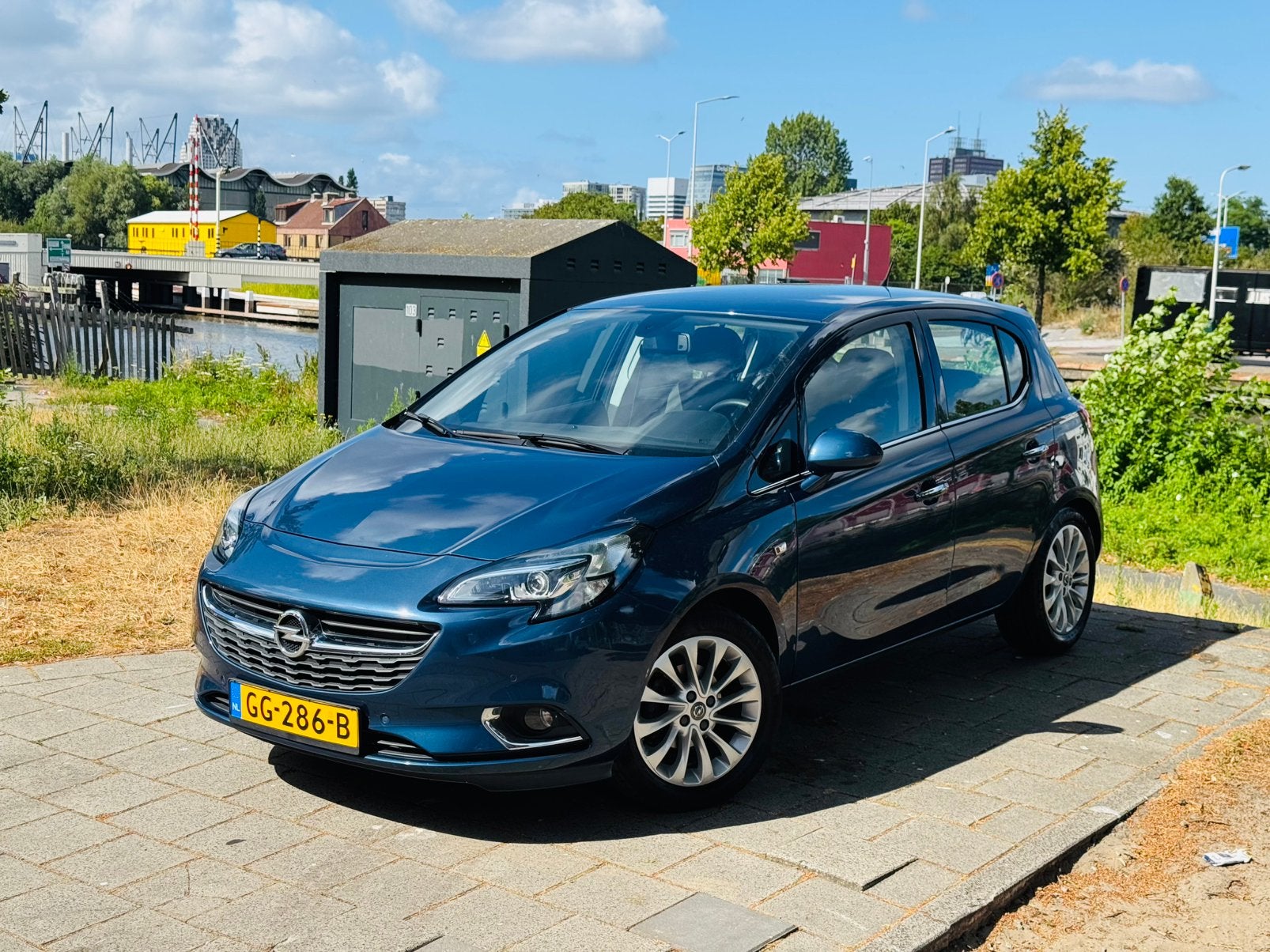 Opel Corsa 1.4 AUT 5D 2015 Bomvol/Klimaat/Cruise/PDC/StoelVe, 1063 kg, 4 cilinders, Blauw, Leder en Stof