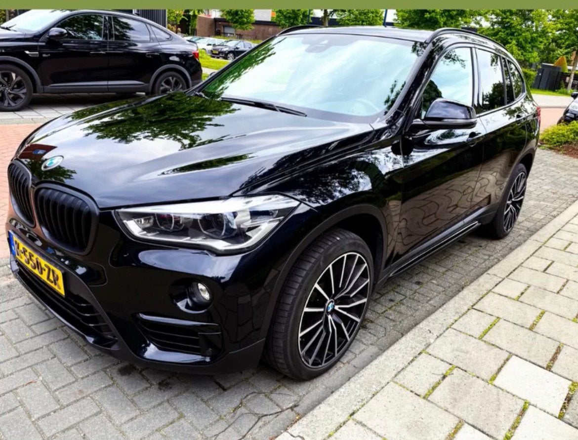BMW X1 sdrive 18i high executive, pano/leer/automaat, Automaat, Zwart, 4 cilinders, Zwart