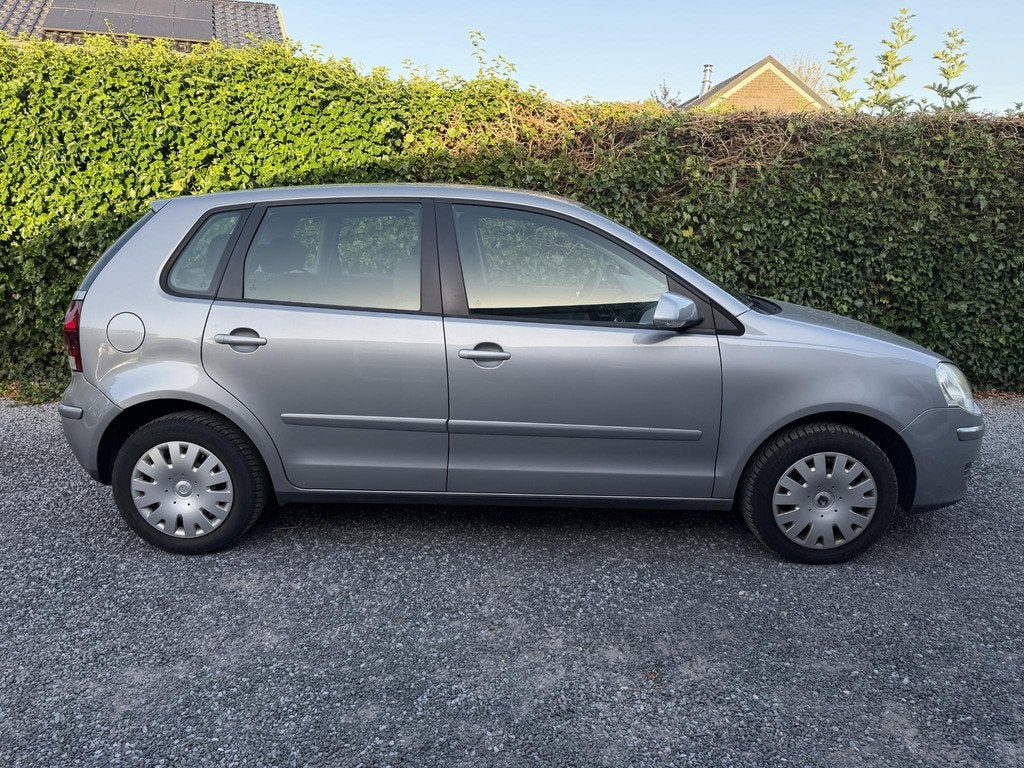 Volkswagen Polo 1.4-16V Optive | Airco | Cruise Control | El, Auto's, Voorwielaandrijving, Stof, Zwart, 4 cilinders