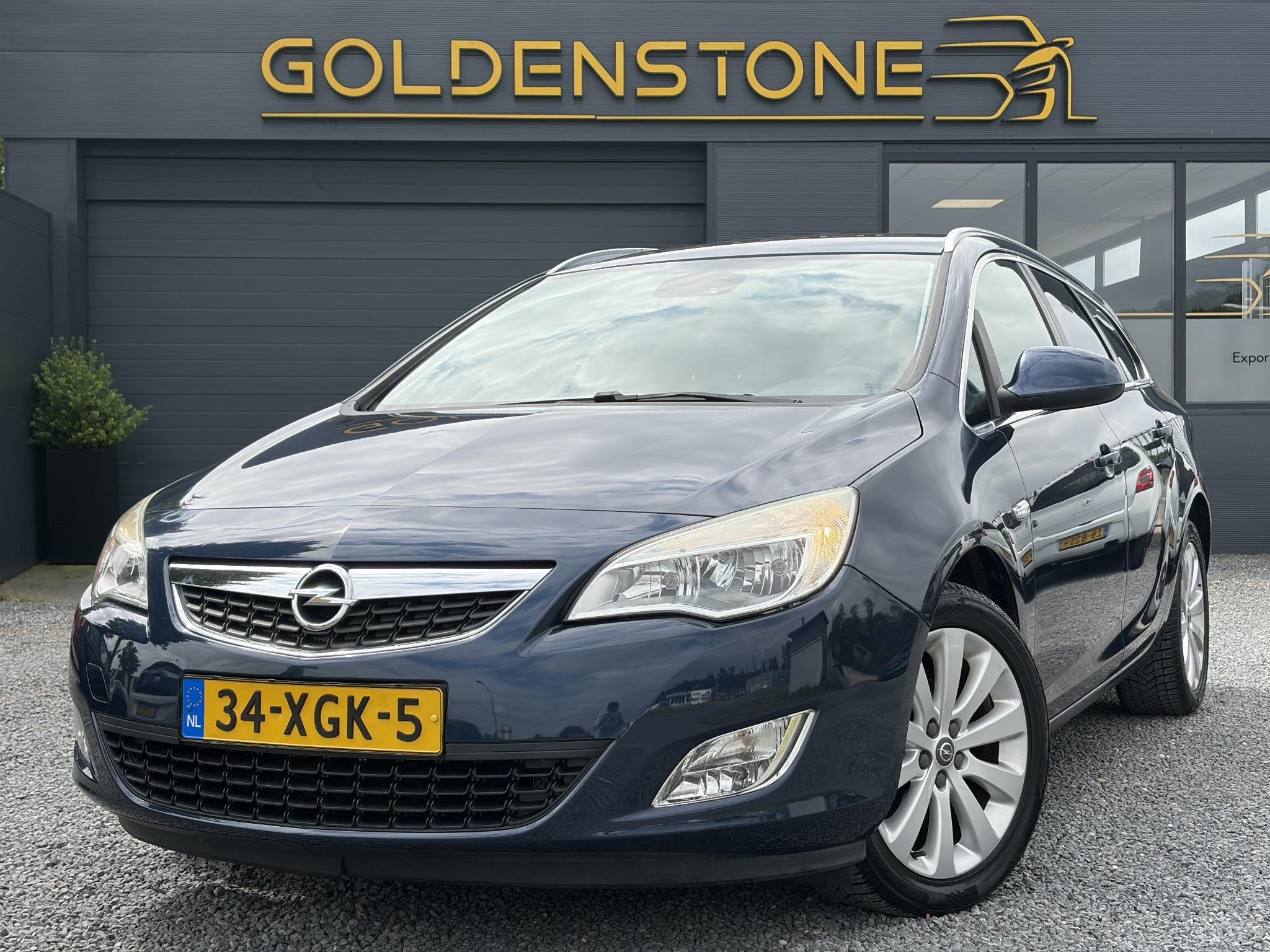 Opel Astra Sports Tourer 1.4 Turbo Cosmo 1e Eigenaar,Navi,Tr, Auto's, Voorwielaandrijving, Euro 5, Stof, Gebruikt