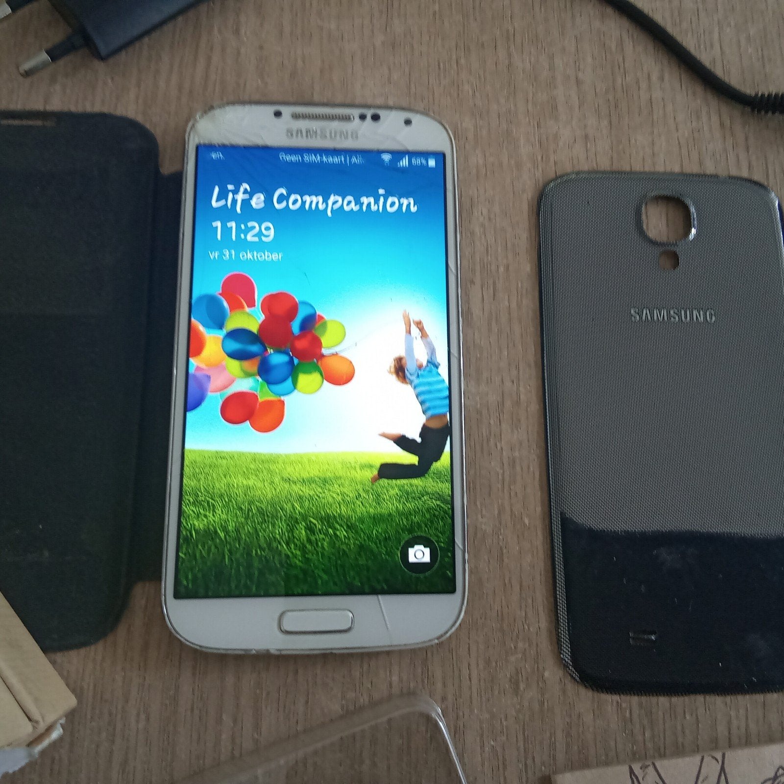 Samsung Galaxy S4 met oplader en nieuwe accu, Ophalen of Verzenden, Zwart