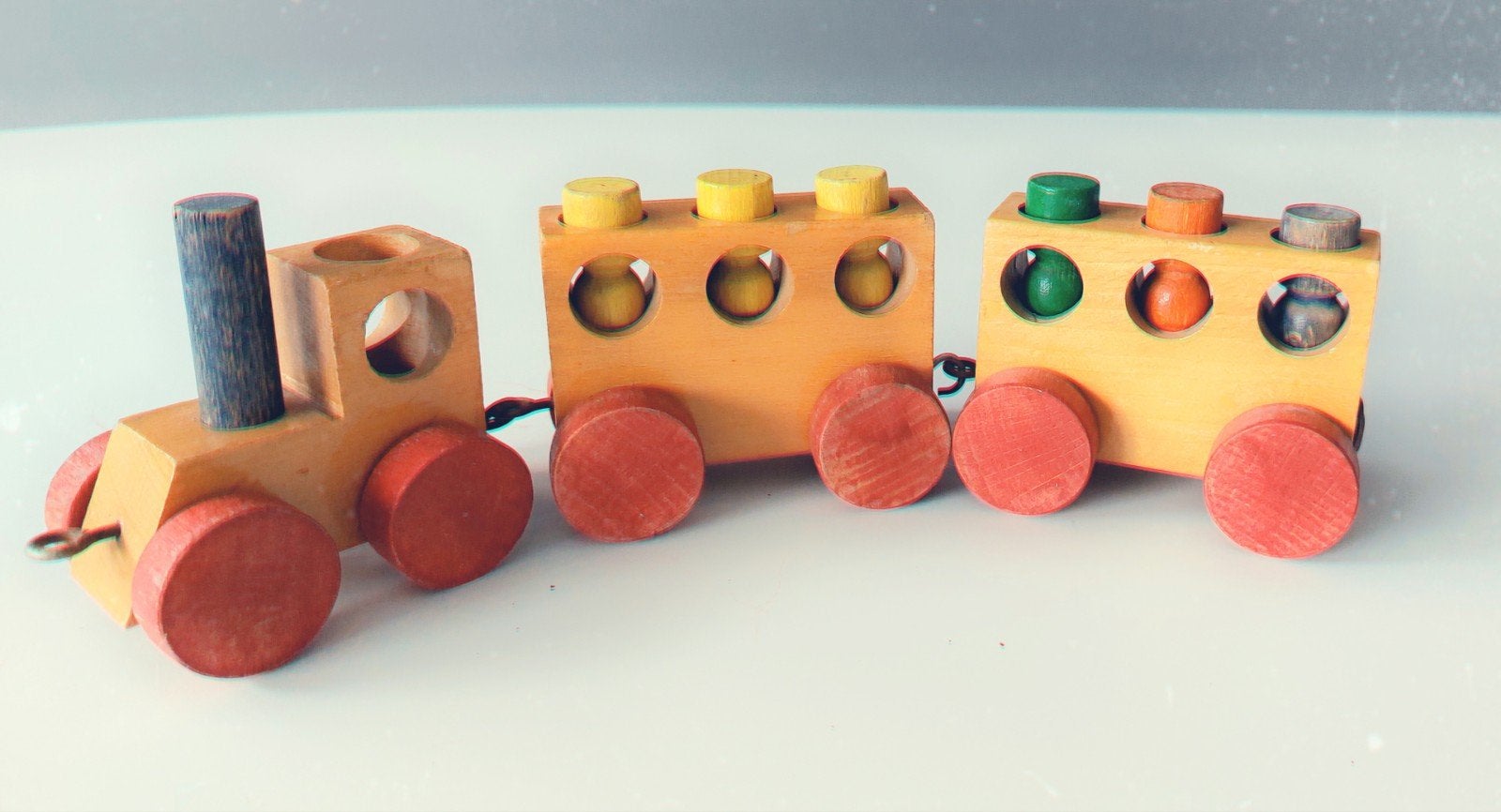 Vintage SIO houten speelgoed: trein, stapeltorens en tol, Ophalen of Verzenden