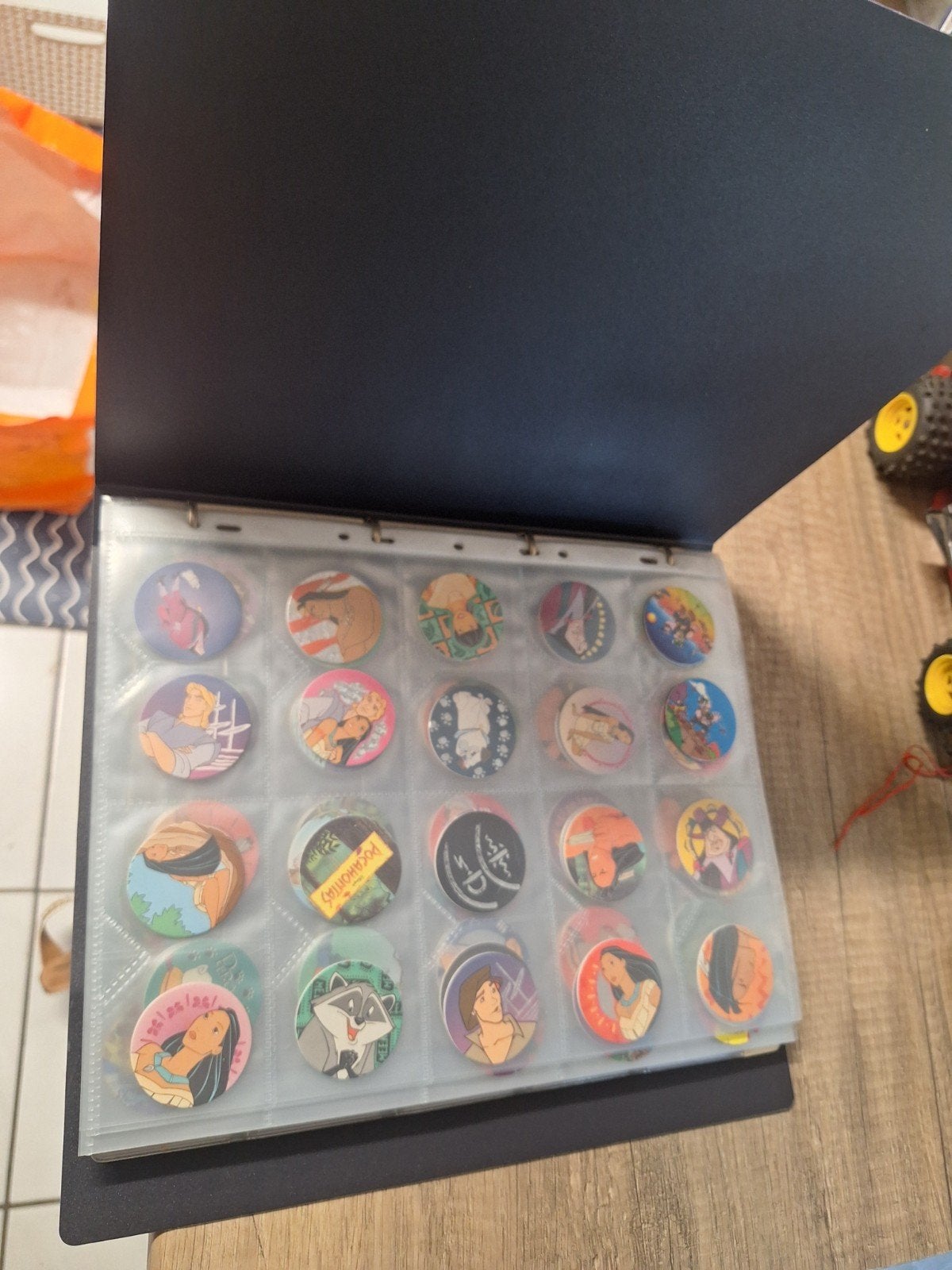 Grote collectie Pogs en Flippo's in verzamelmap jaren 90, Ophalen of Verzenden