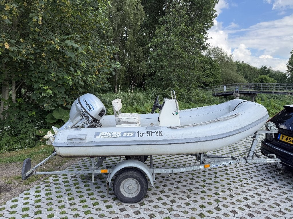 Joker 315 RIB met 15 PK 4-takt Nimarine en trailer, Watersport en Boten, Gebruikt, 15 pk, Peddels, Nimarine