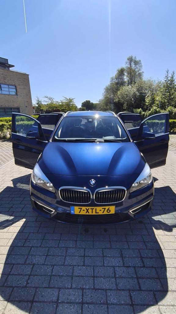 BMW 2-Serie Active Tourer 218i 136pk 2014 Blauw, Auto's, Voorwielaandrijving, 136 pk, Blauw, Handgeschakeld