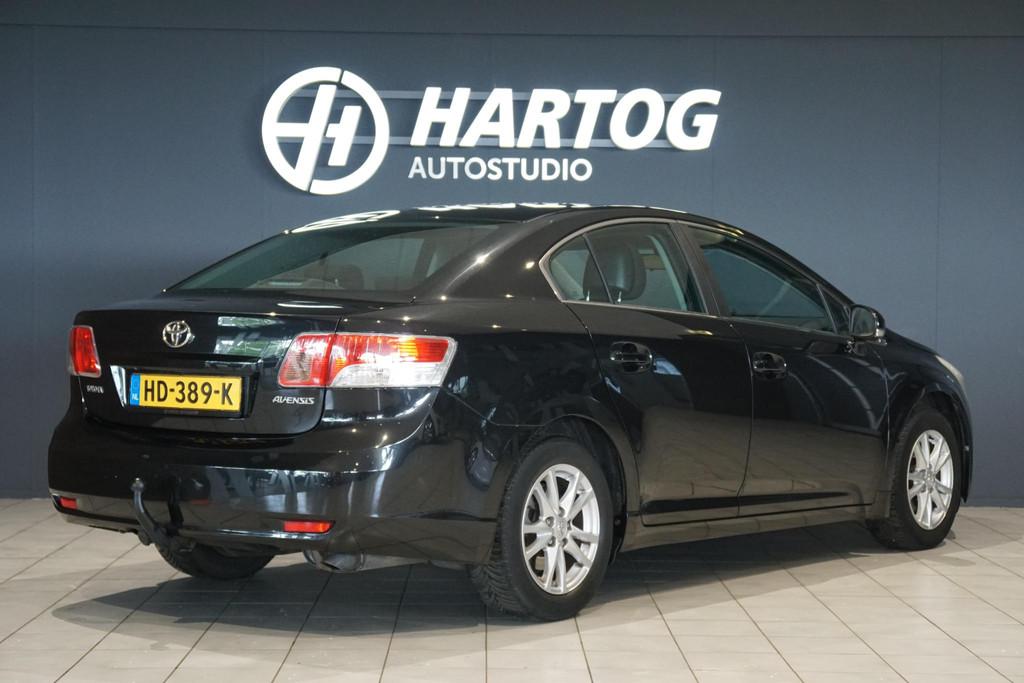 Toyota Avensis 1.8 VVTi Business + CAMERA / TREKHAAK, Auto's, Voorwielaandrijving, Euro 5, Zwart, Bedrijf