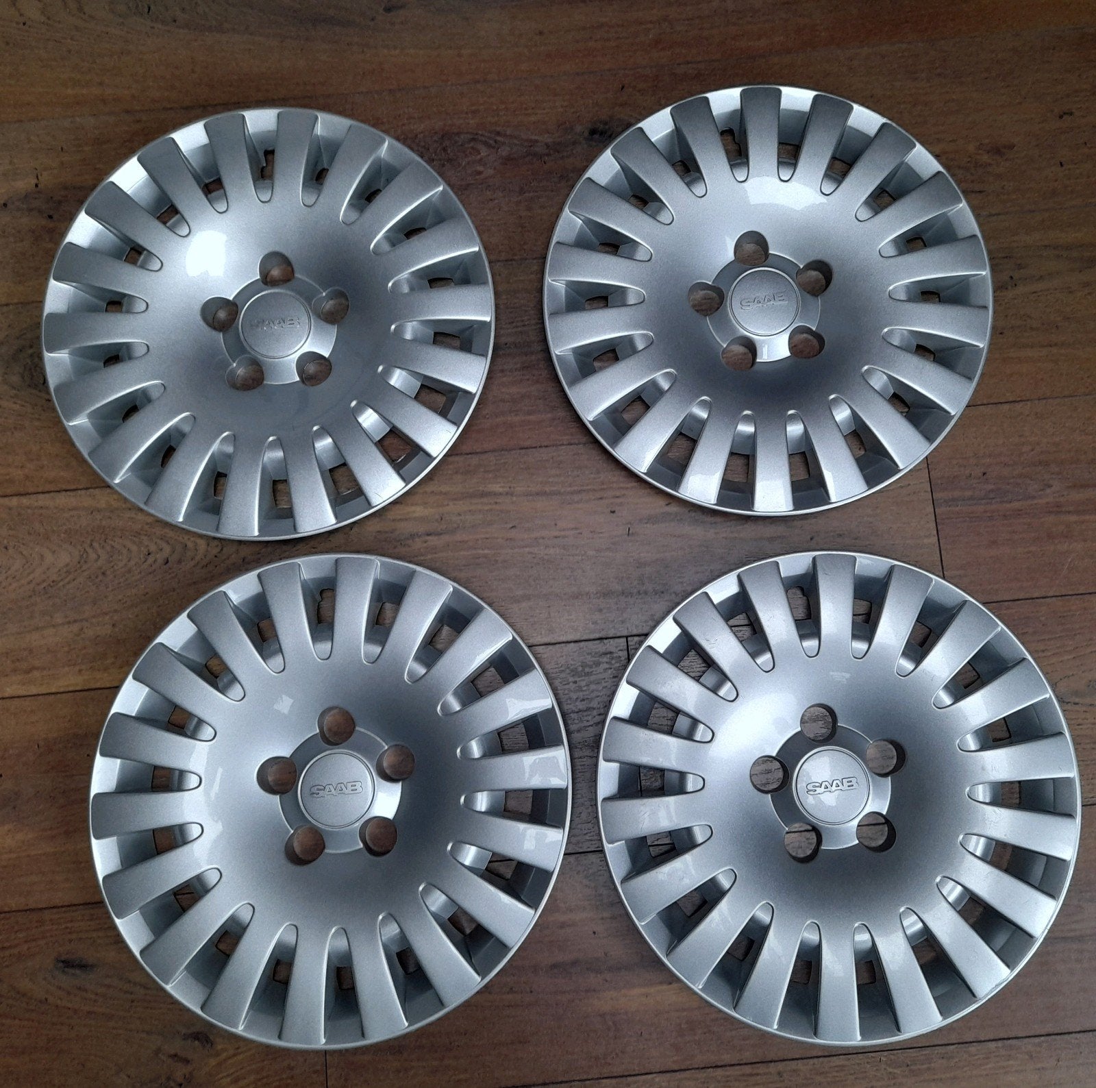 Saab wieldoppen 15 inch (set van 4), Ophalen of Verzenden, Gebruikt