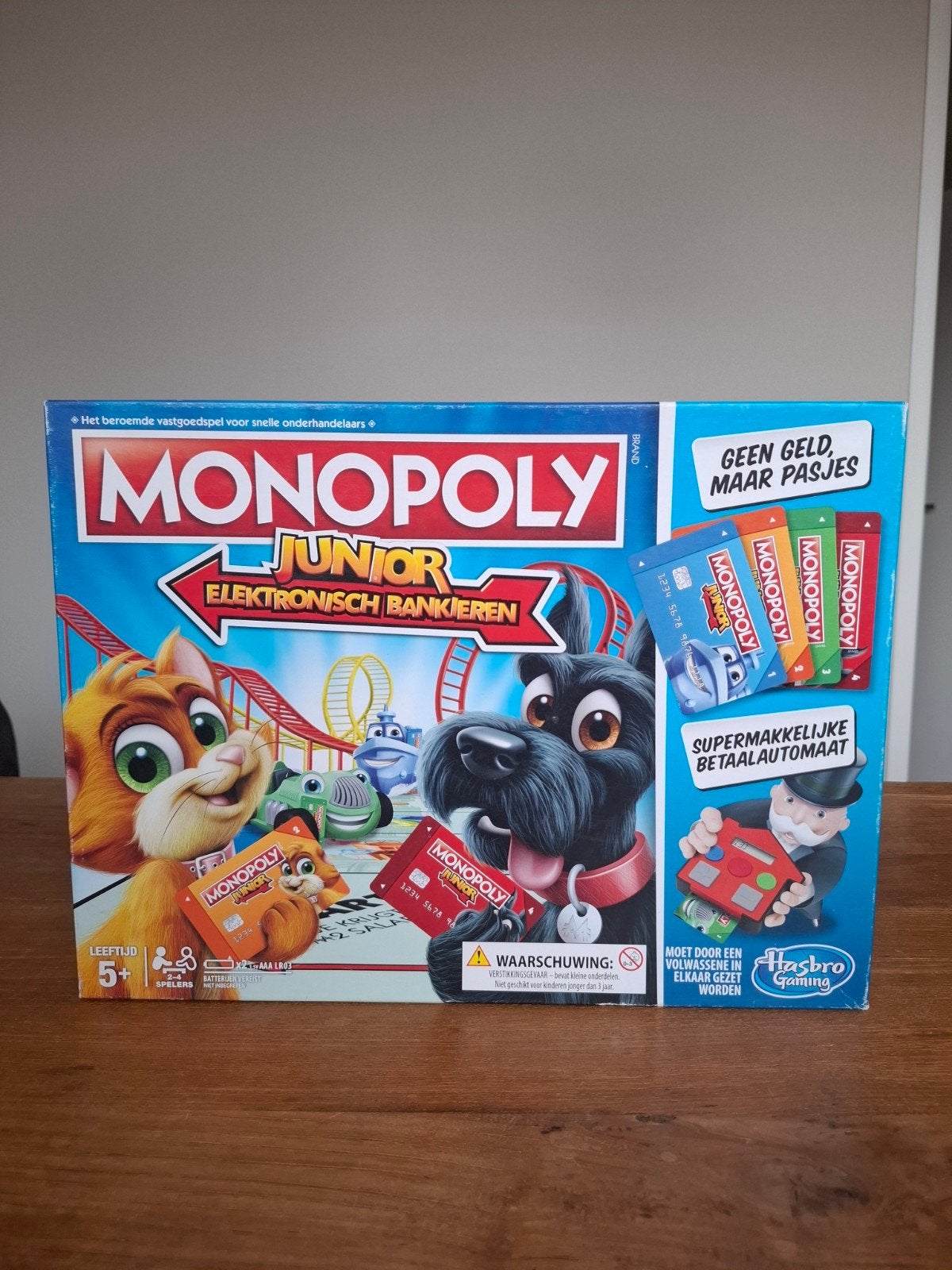 Monopoly Junior Elektronisch Bankieren - Netjes en Compleet, Hobby en Vrije tijd, Gezelschapsspellen | Bordspellen, Drie of vier spelers