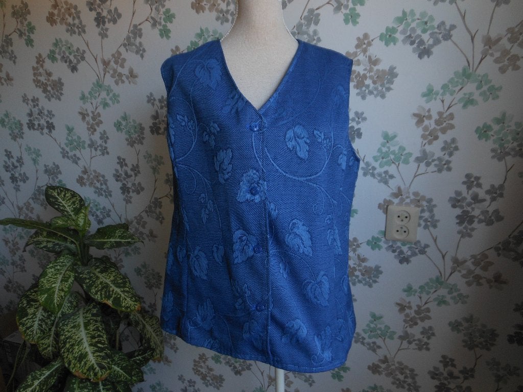 Mouwloos vest, Ophalen of Verzenden, Zo goed als nieuw, Maat 42/44 (L), Blauw