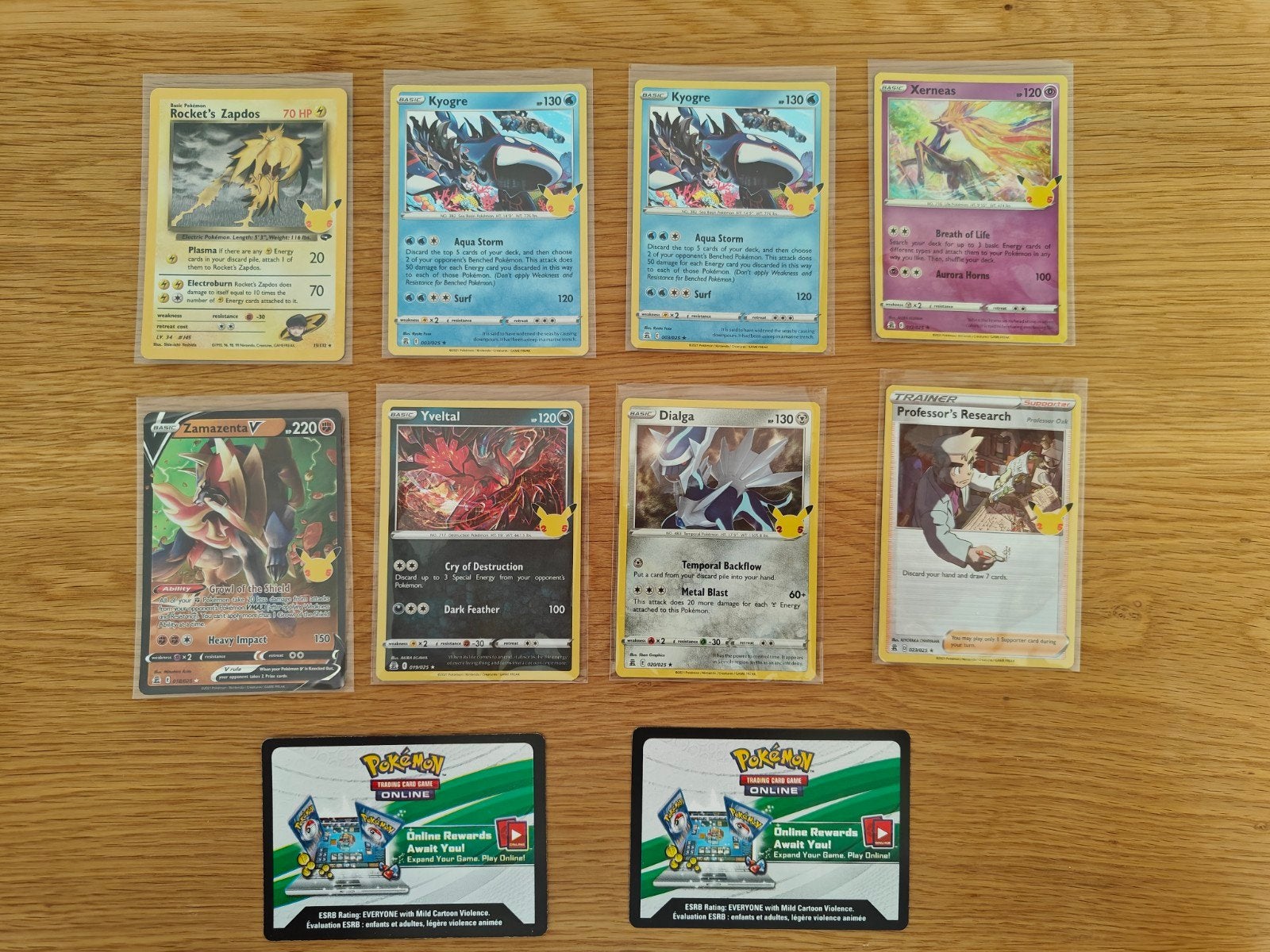 Pokémon 25 celebrations, S&M, Sword&Shield, Scarlet&Violet, Ophalen of Verzenden, Zo goed als nieuw, Meerdere kaarten, Foil