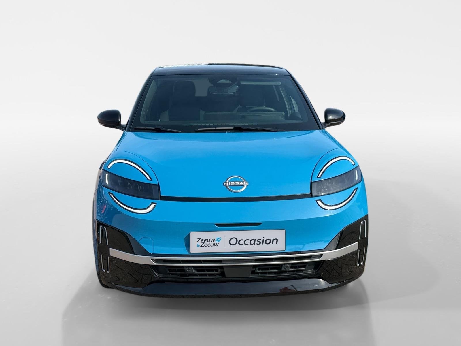 Nissan Micra EVOLVE 52 kWh *Navi+Camera*Winter Pack*Harman K, 150 pk, Blauw, Leder en Stof, Origineel Nederlands