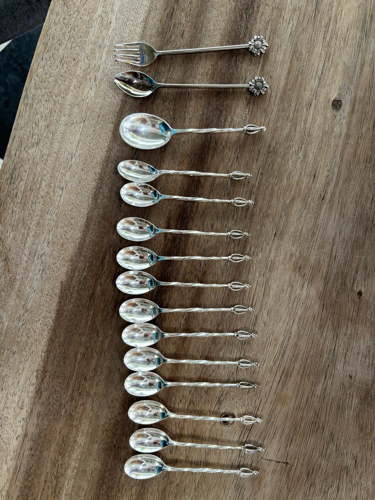 Zilveren lepeltjes en vorkjes set, Ophalen