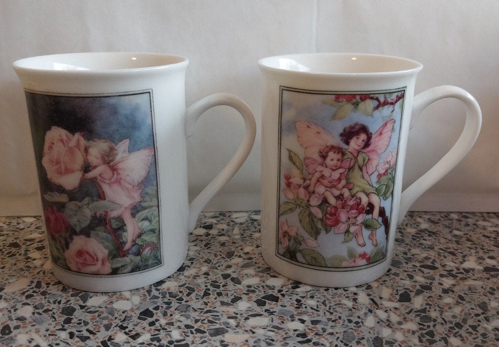 2 bekers flower fairies bloemenkinderen, Zo goed als nieuw, Overige stijlen, Porselein, Mok