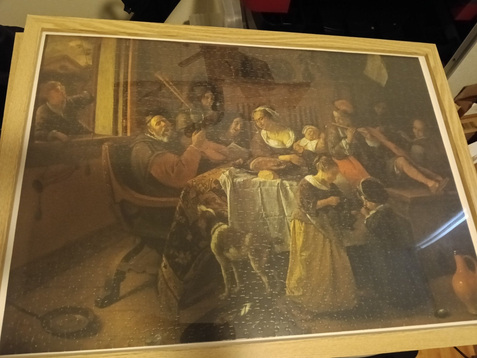 Ingelijste puzzel: De Vrolijke Familie van Jan Steen, Ophalen