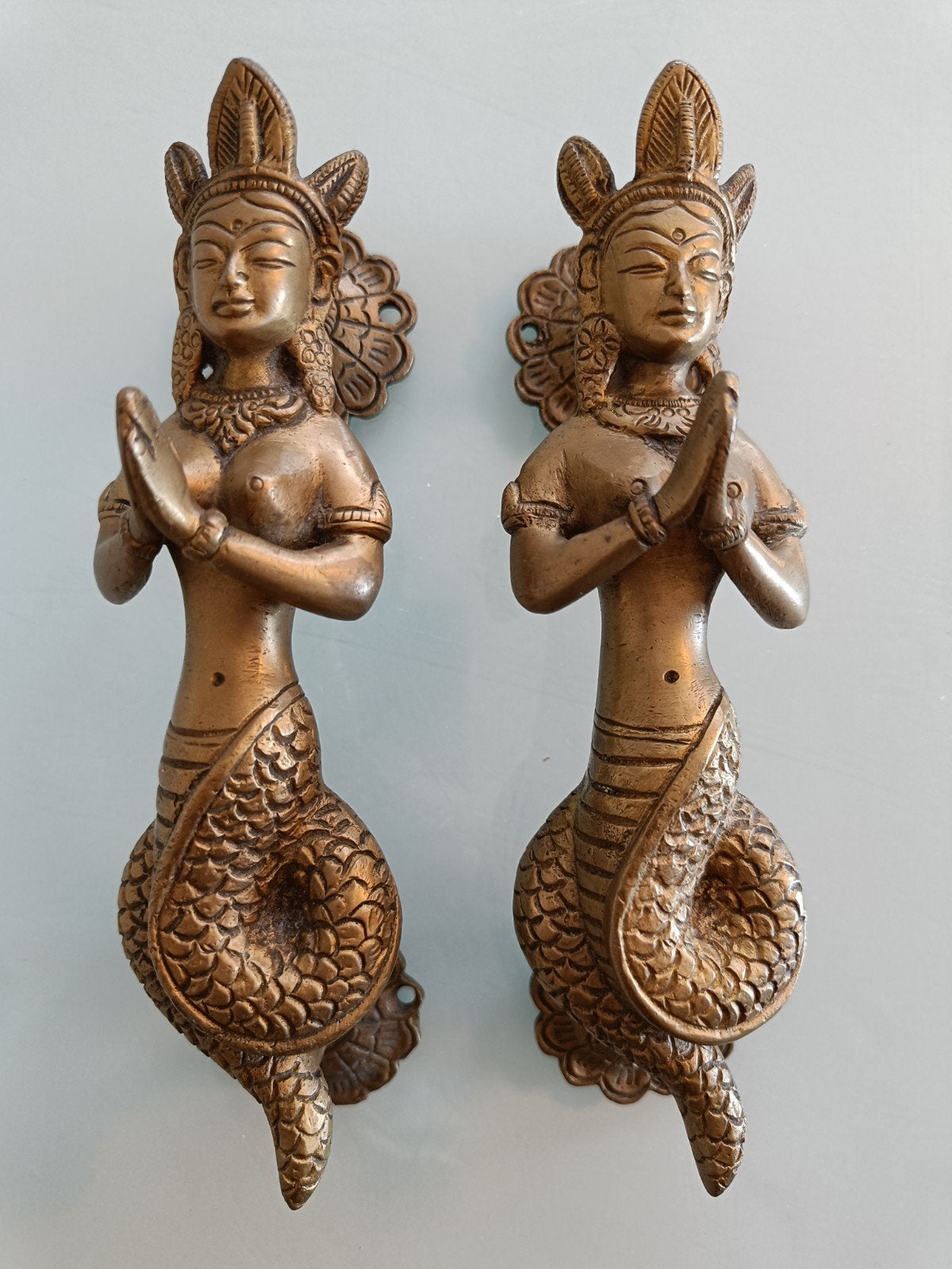 Koppel bronzen Nagakanya deurgrepen., Antiek en Kunst, Ophalen of Verzenden