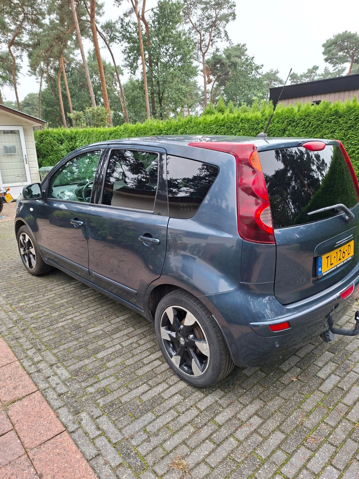Foto 4 van nissan note 1.4 groen perfect onderhouden.