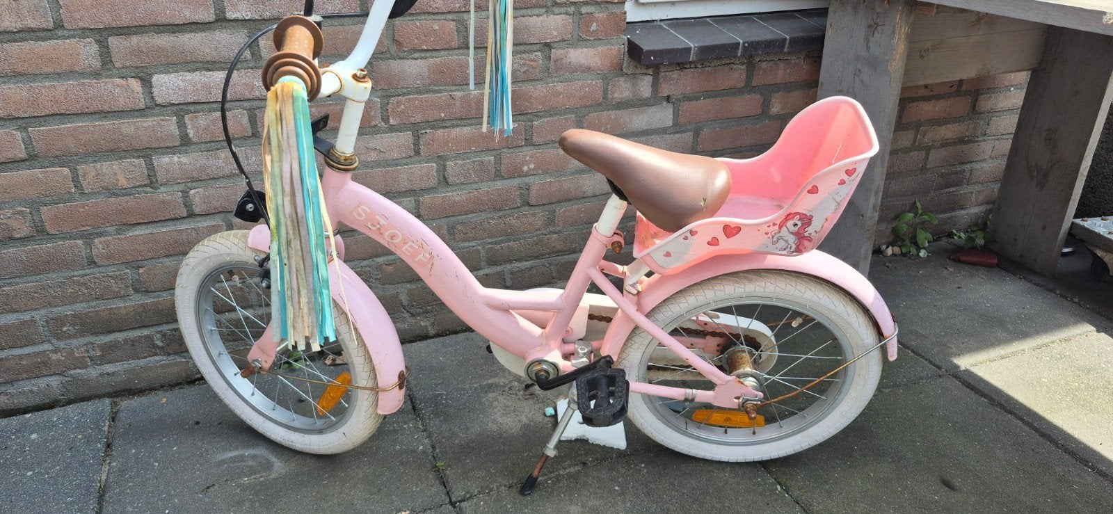 Meisjesfiets, Ophalen