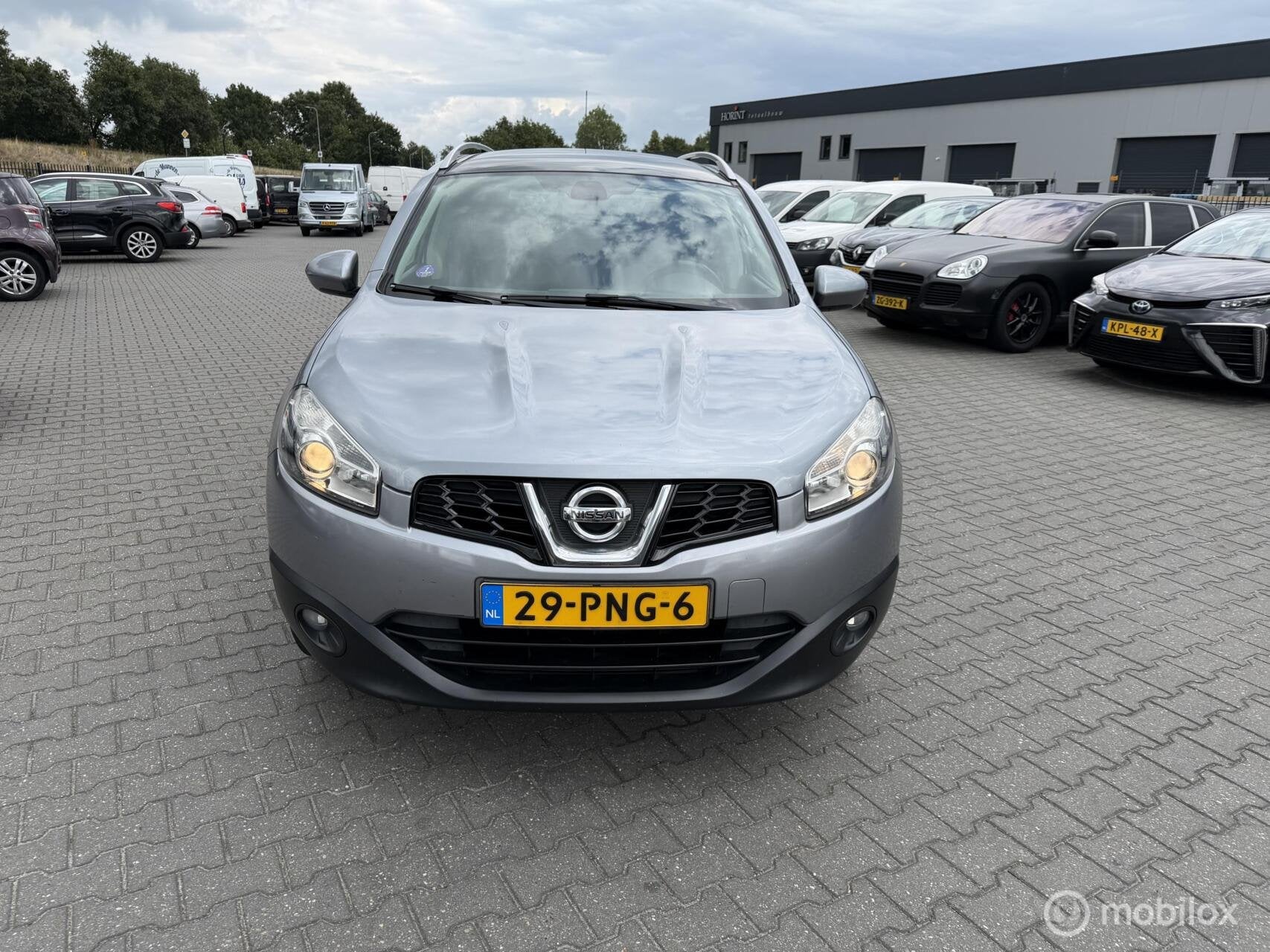 Nissan Qashqai +2 1.6 Optima 7 zits clima, Auto's, Voorwielaandrijving, Euro 5, Stof, Zwart