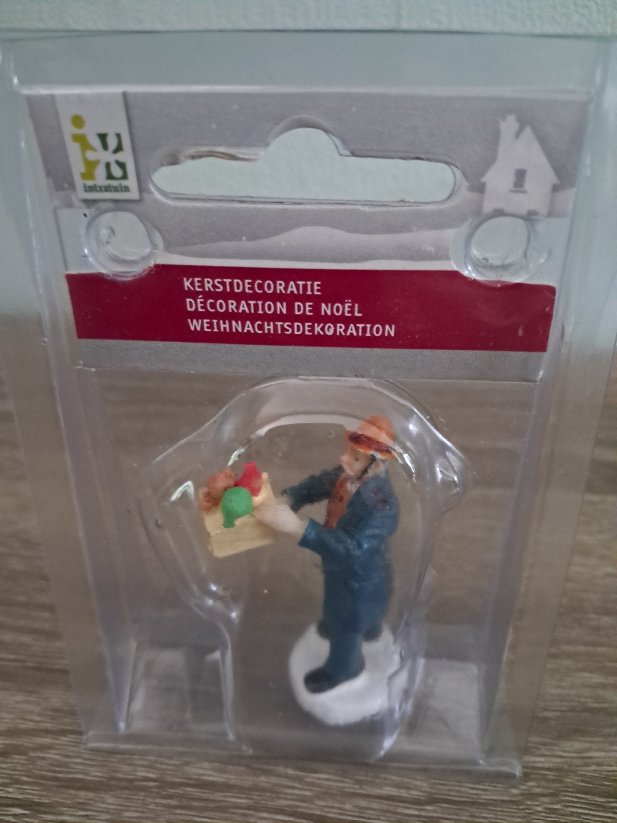 Intratuin man met kadootje, Ophalen