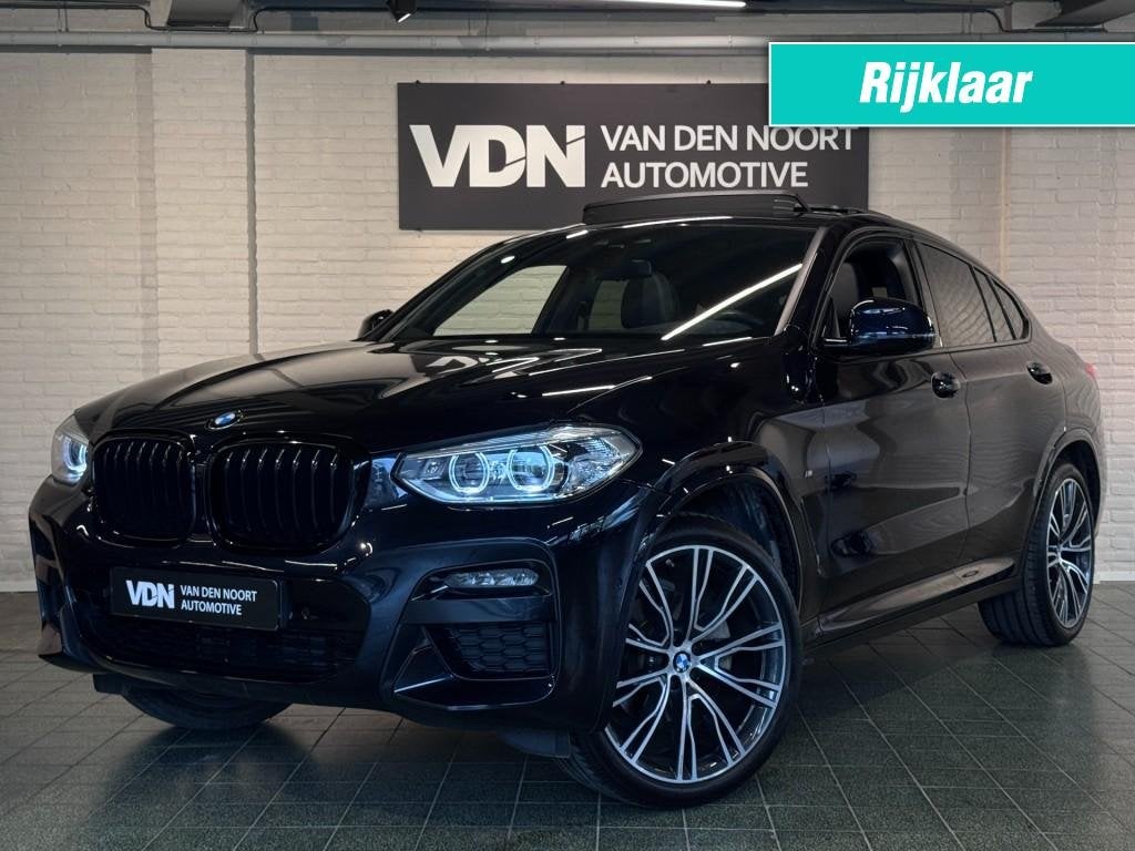 Bmw X4 xDrive20i High Executive M-Sport Pano Camera Trekhaak, Automaat, Gebruikt, 4 cilinders, Zwart