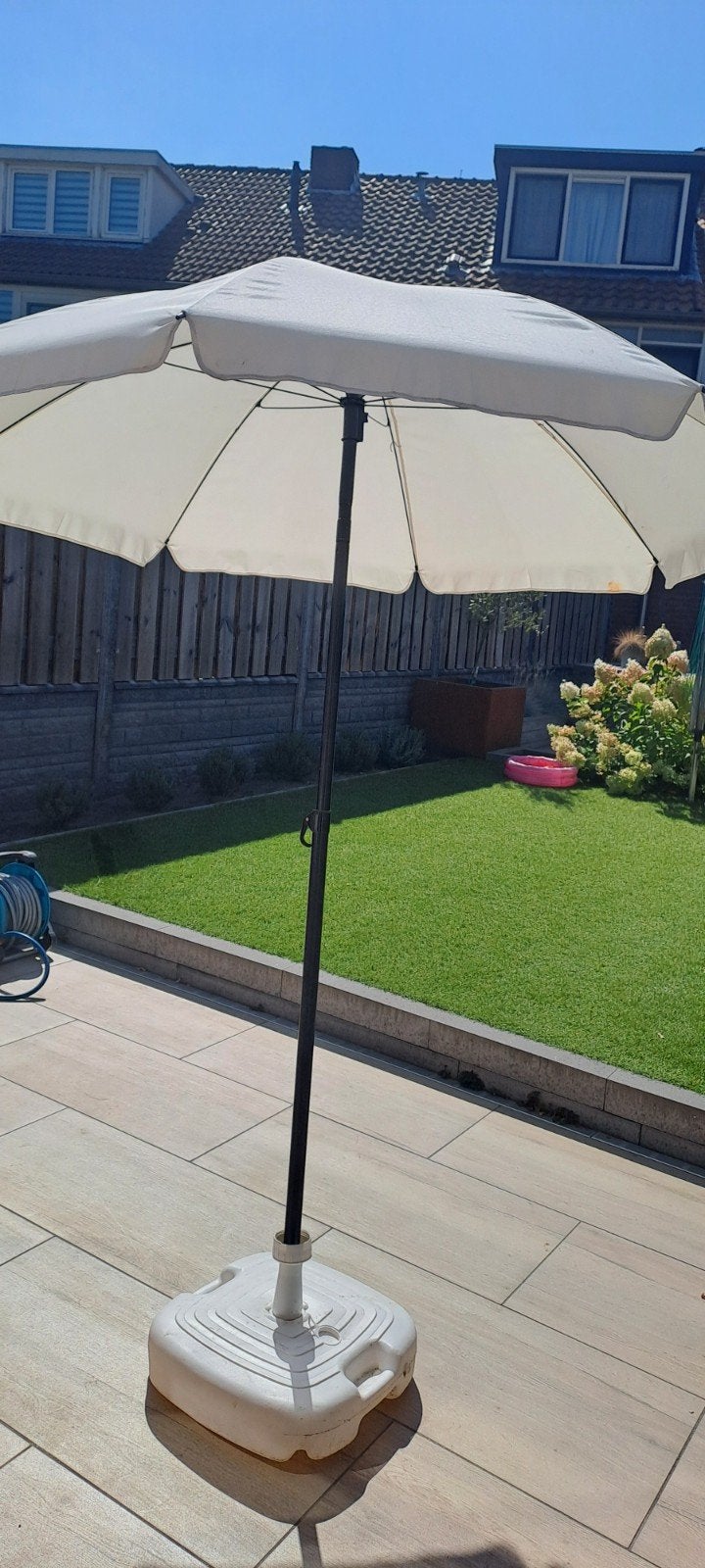 parasol met voet, Ophalen
