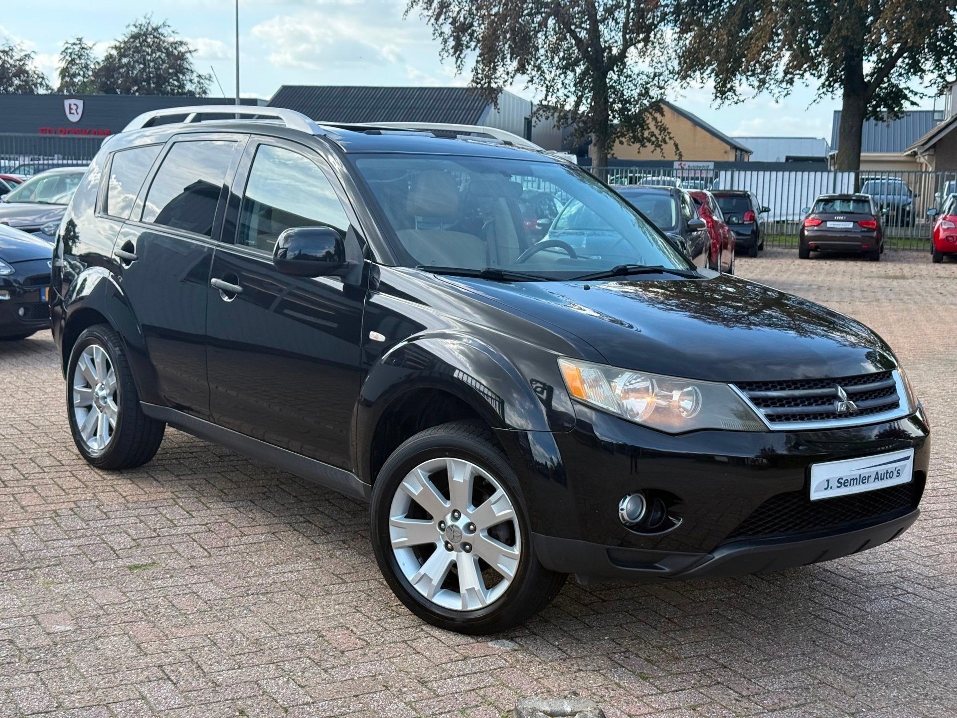Mitsubishi Outlander 3.0 V6 AUTOMAAT NAVI SCHUIFDAK LEER, Auto's, Automaat, 635 kg, Stoelverwarming, Zwart