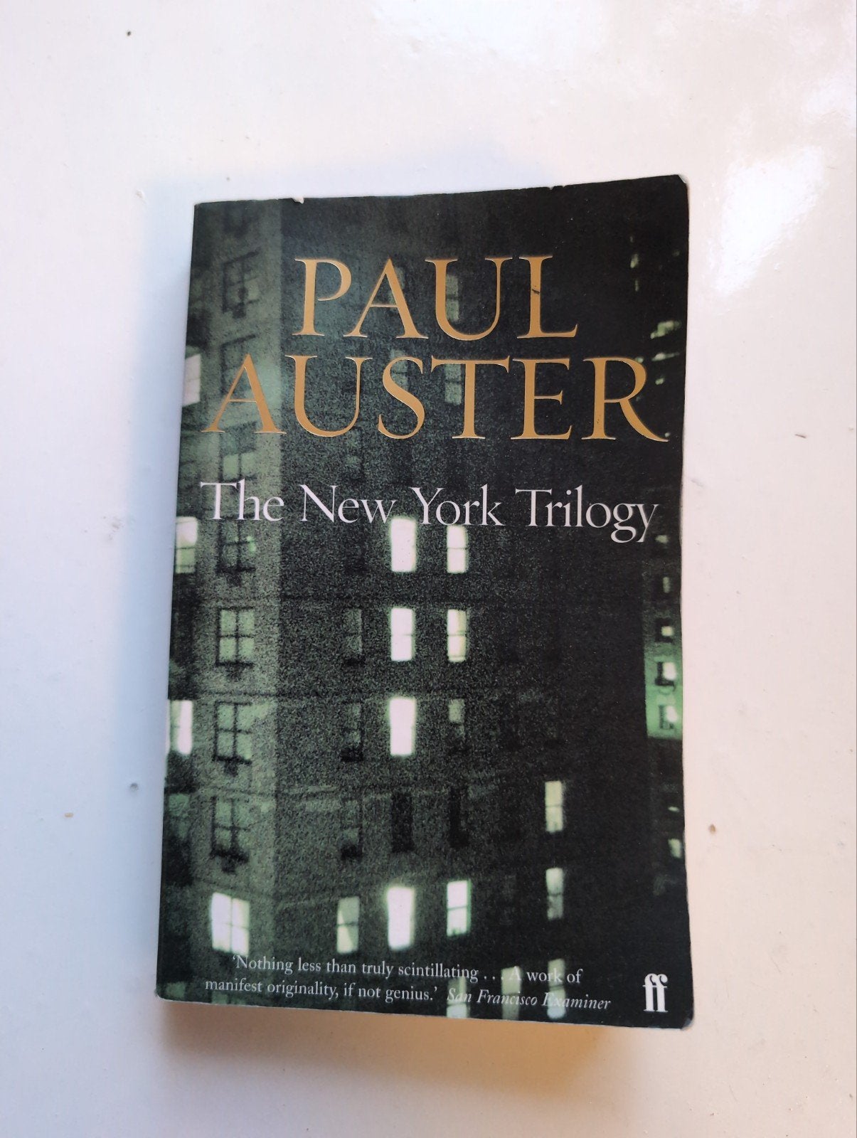 the New York Trilogy, van Paul Auster, Ophalen, Zo goed als nieuw