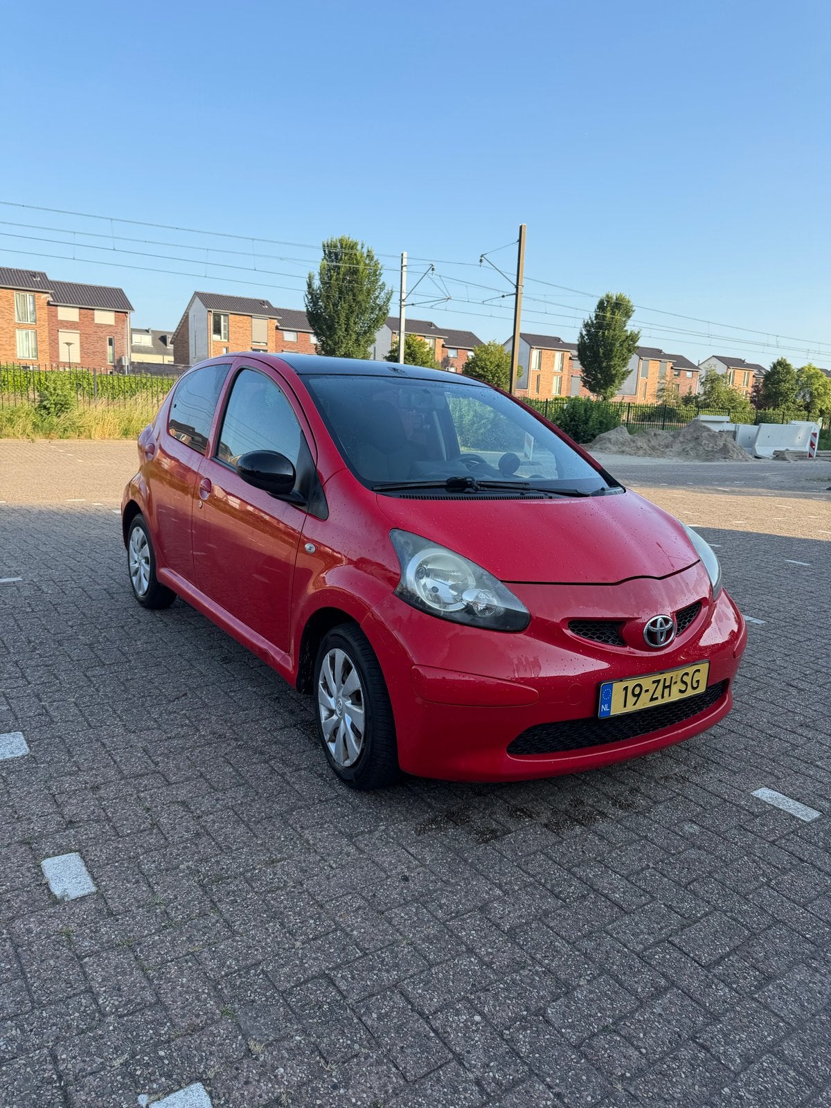 Toyota Aygo 1.0 12V Vvt-i 5DRS 2008 Rood, Auto's, Voorwielaandrijving, Stof, Zwart, 4 stoelen