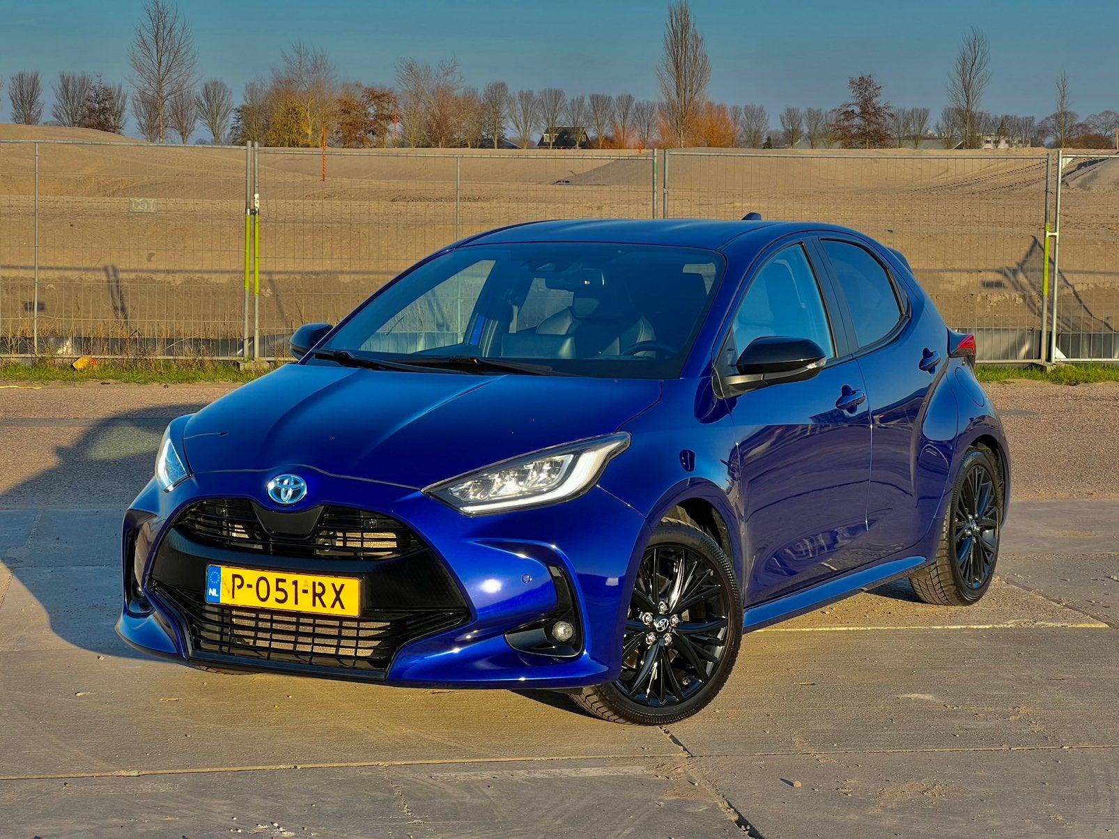 Toyota Yaris 1.5 2022 hybrid Executive NAP GARANTIE FULLOPT, Dealer onderhouden, 450 kg, Blauw, Verwarmde buitenspiegels