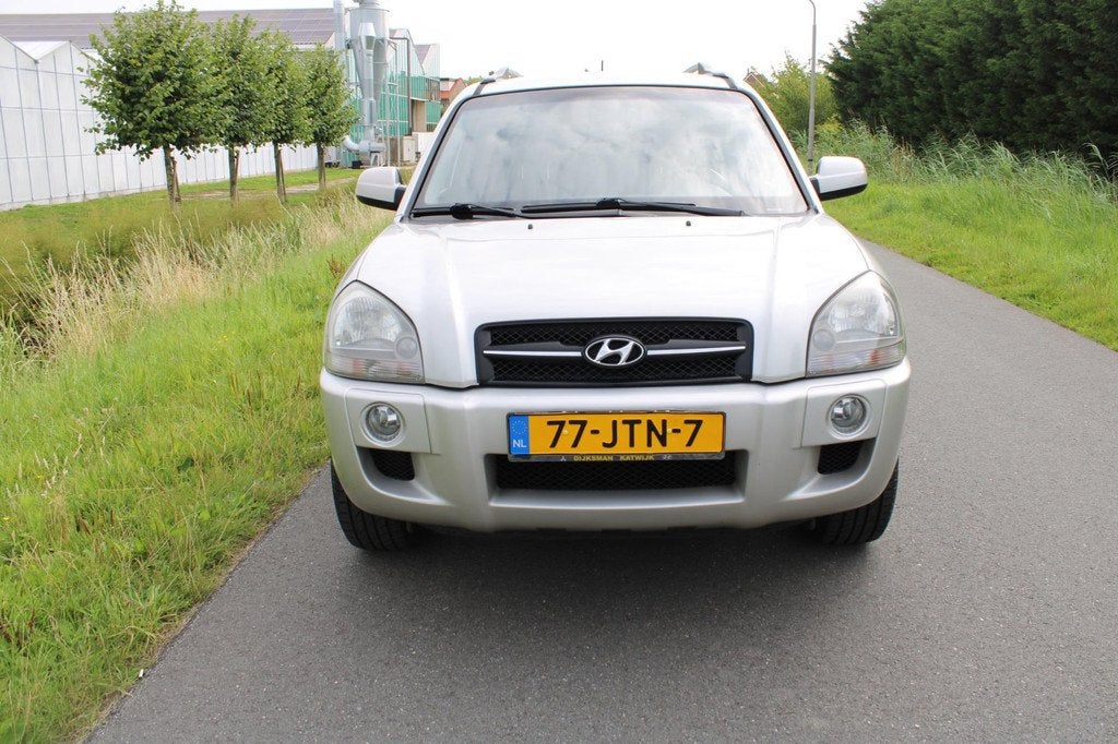 Hyundai Tucson 2.0i Style Supreme met Leder en Climate contr, Auto's, Hyundai, 4 cilinders, Handgeschakeld, Tucson, Zilver of Grijs