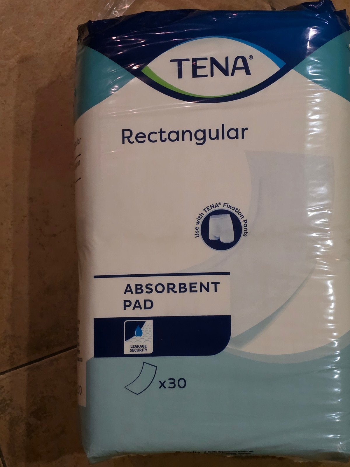Tena rechthoekige absorberende pads., Ophalen, Nieuw