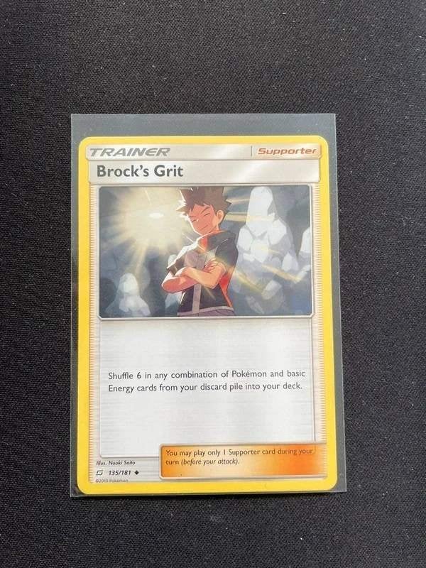Brock's Grit (TEU 135) - Pokemon Team Up, Hobby en Vrije tijd, Ophalen of Verzenden, Zo goed als nieuw, Losse kaart, Foil