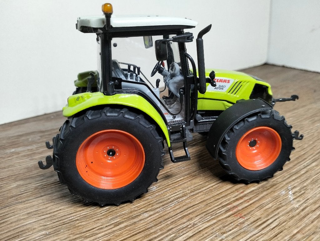 Te koop USK Claas Atos 340 .(A), Ophalen of Verzenden, Zo goed als nieuw, Tractor of Landbouw, Overige merken