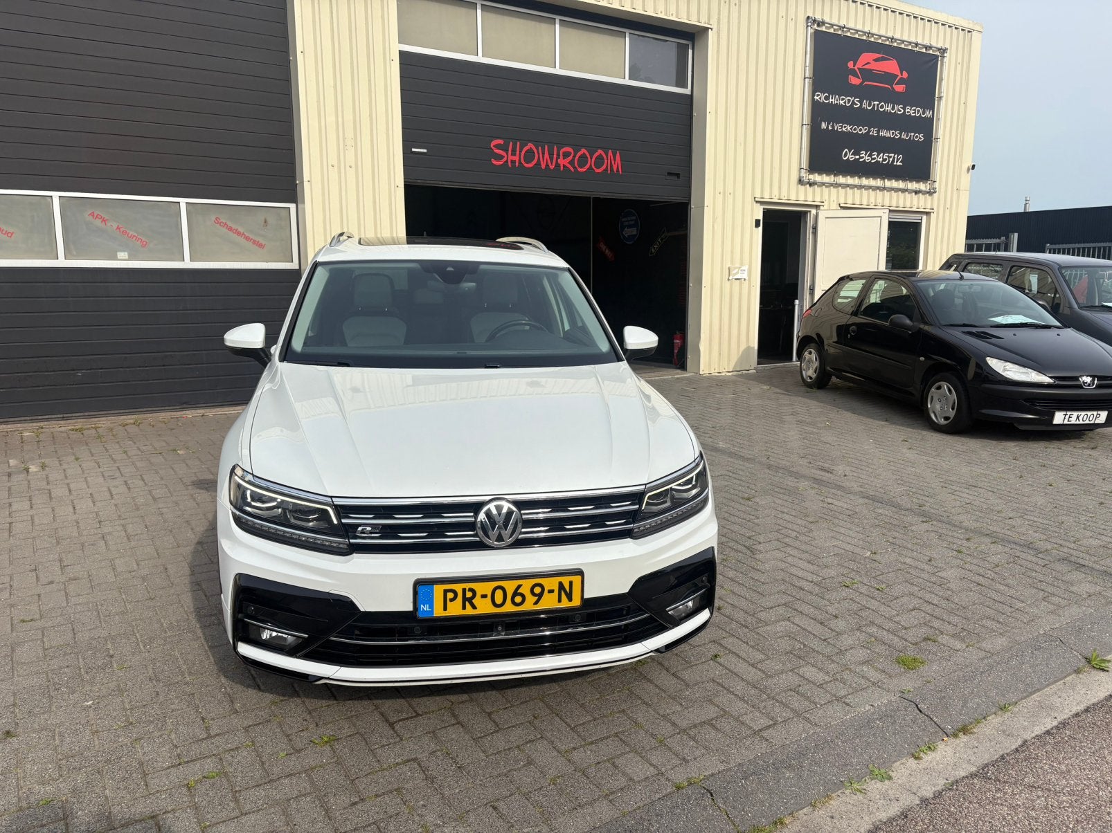 Volkswagen Tiguan 1.4 TSI R-line110KW DSG 2017 parelmoer Wit, Euro 5, Zwart, 4 cilinders, Wit