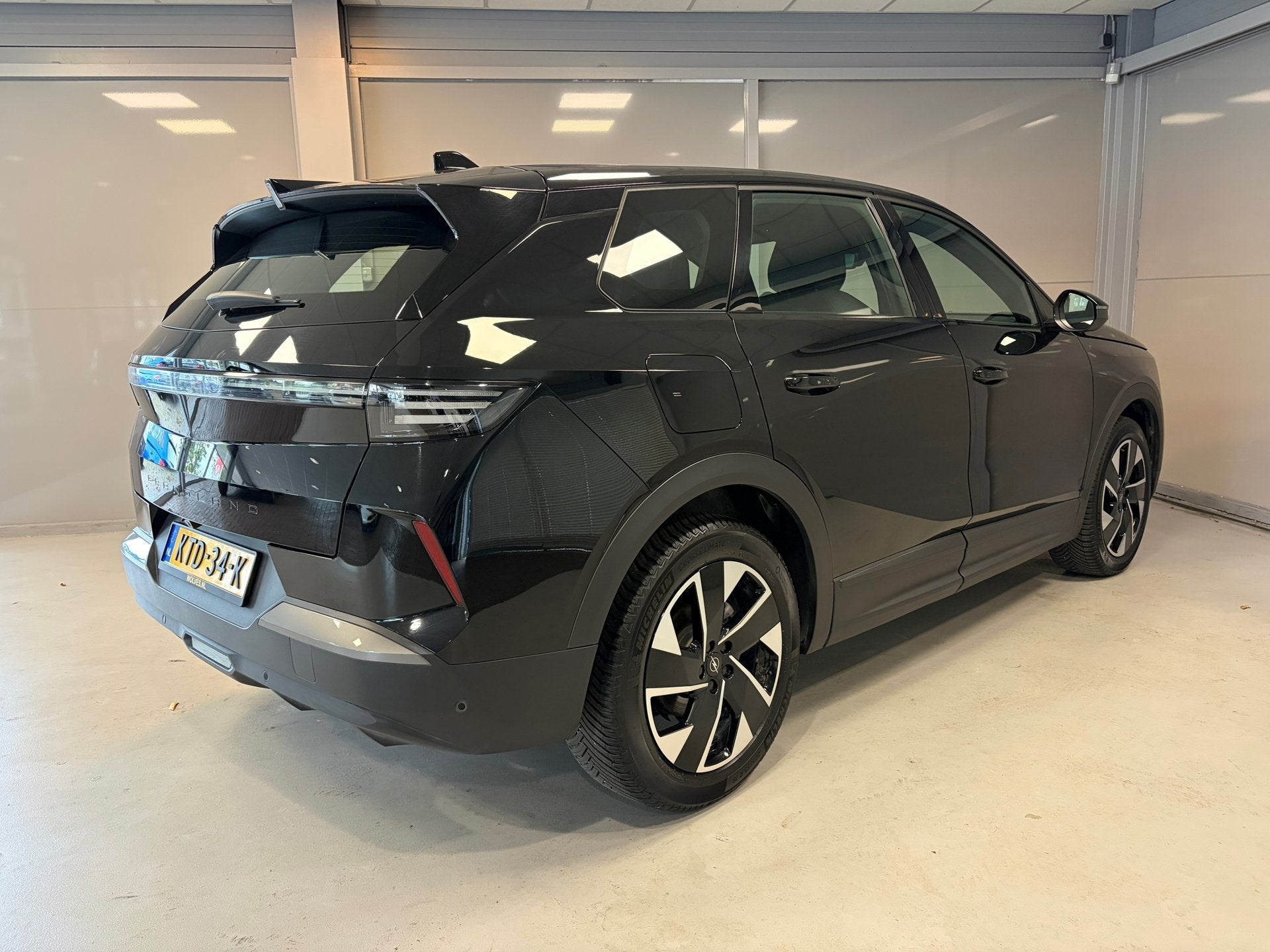 Opel GRANDLAND GS 1.2 Turbo Hybrid 145pk | Cruise control ad, Auto's, Stof, Gebruikt, 1199 cc, Zwart