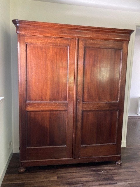 Antieke mahoniehouten kast, Ophalen