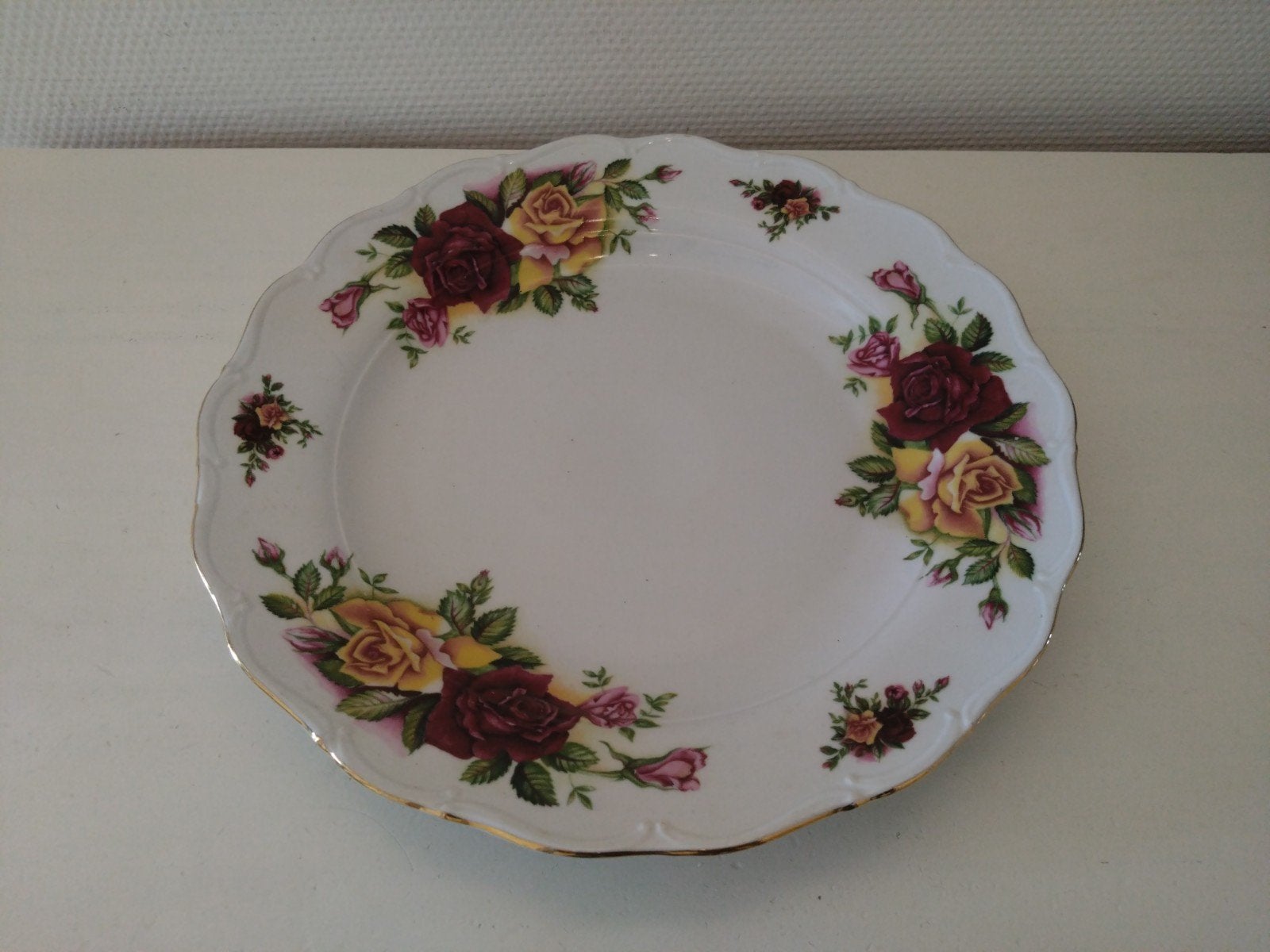 Tsjechoslowaakse bord met rozen., Antiek en Kunst, Ophalen of Verzenden