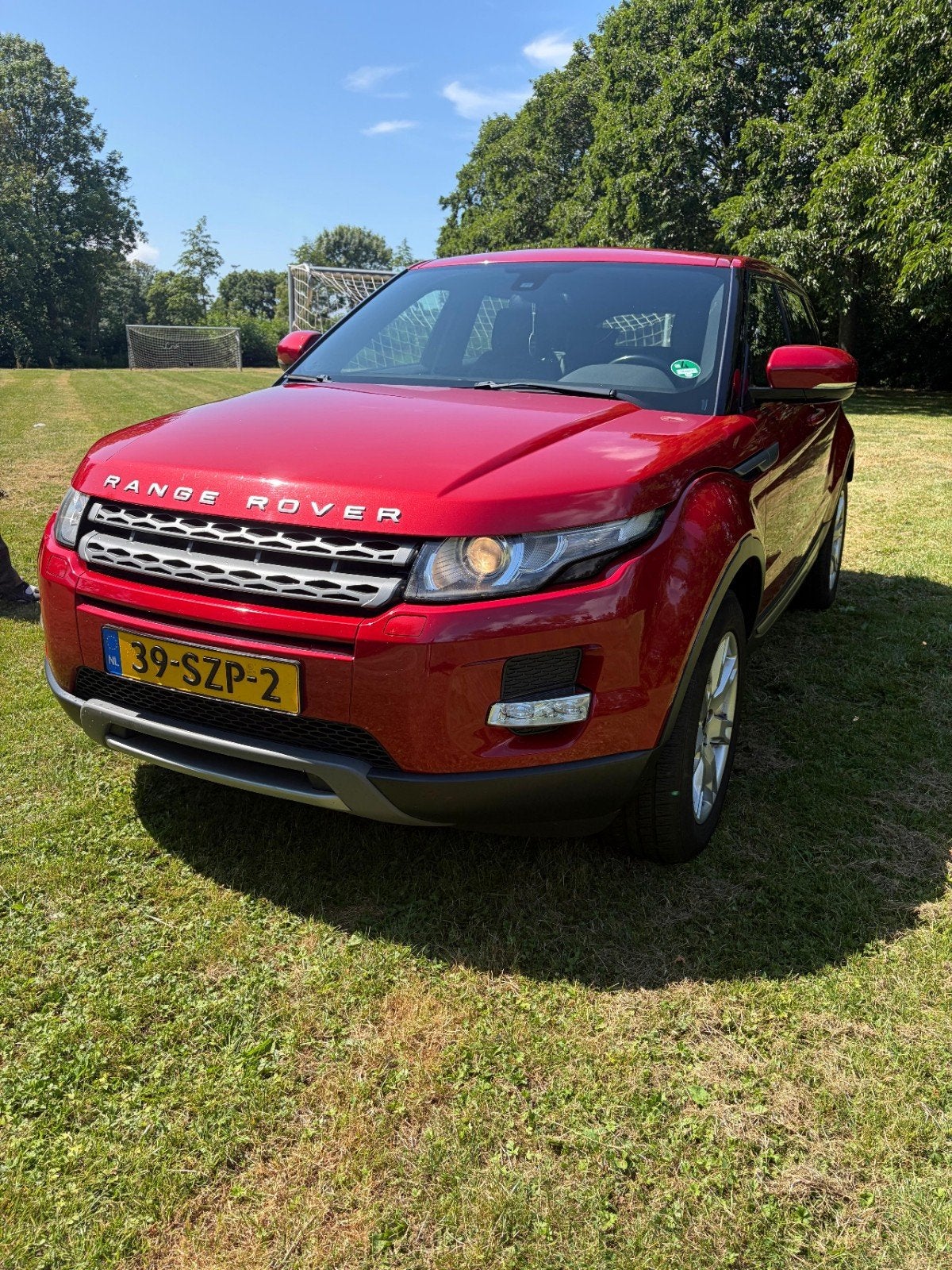 Land Rover Range Rover Evoque SI4 4WD AUT 2012 Rood, Auto's, Automaat, 1800 kg, 4 cilinders, Vierwielaandrijving
