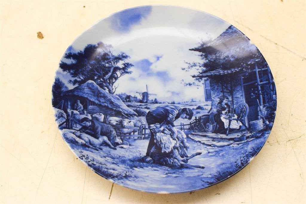 Delft Blauw porseleinen wandbord met prent van een man die s, Ophalen of Verzenden, Gebruikt