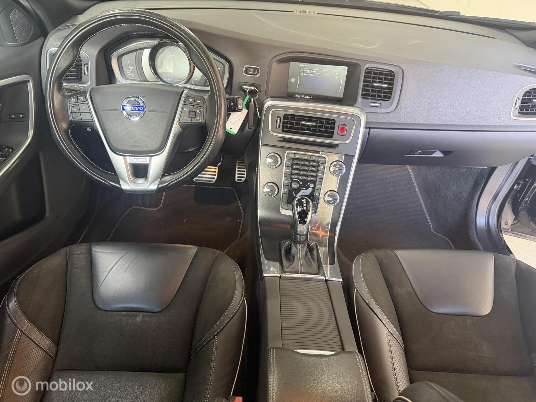 Volvo V60 2.0 T4 Sport AUTOMAAT / NL-AUTO / NAVI, Auto's, Volvo, Gebruikt, Euro 6, 1969 cc, Zwart