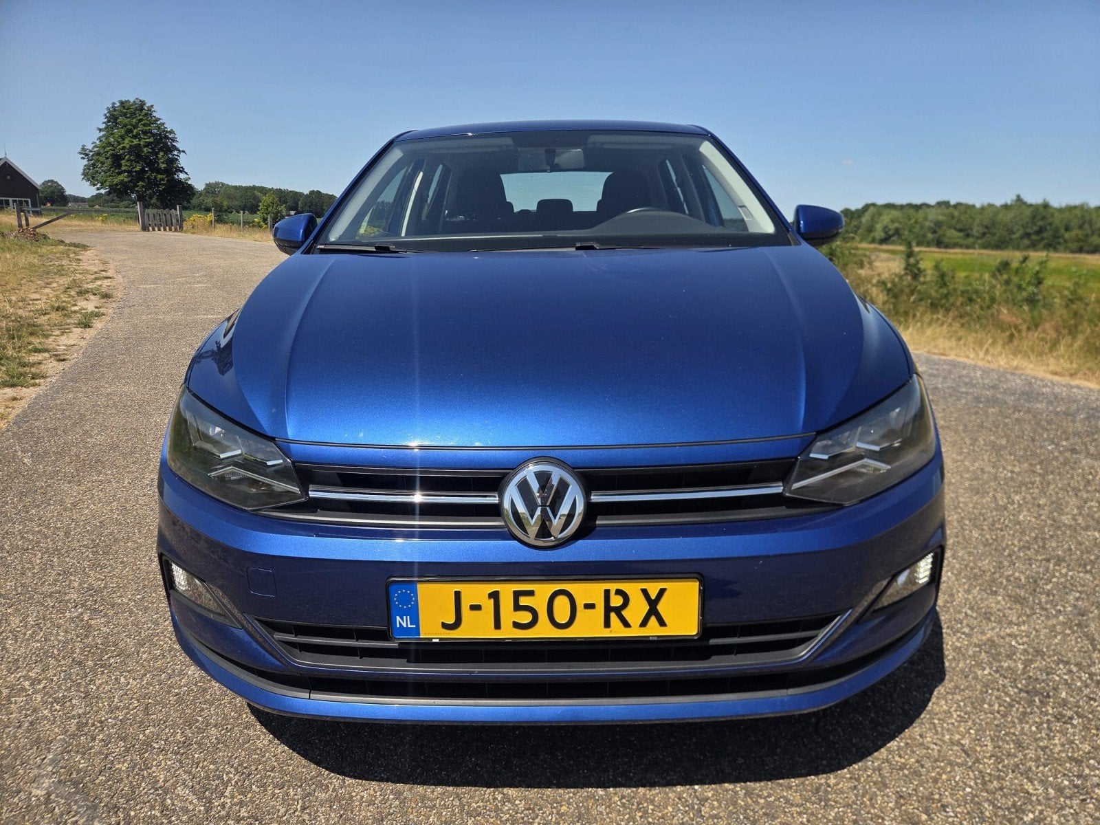 Volkswagen Polo 1.0 TSI 95pk 2020 Blauw, Voorwielaandrijving, Parkeerassistent, Stof, Zwart