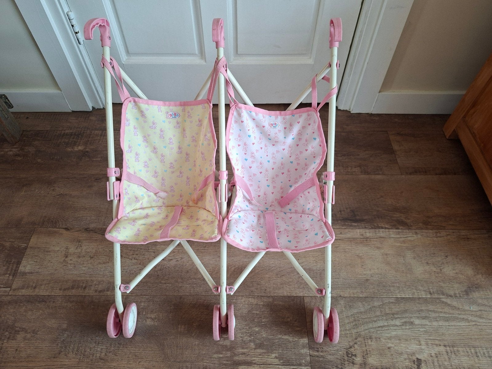 BABY born Tweeling Buggy - Roze/Geel Speelgoed Kinderwagen, Kinderen en Baby's, Gebruikt, Duowagen, Ophalen of Verzenden, Kinderwagen