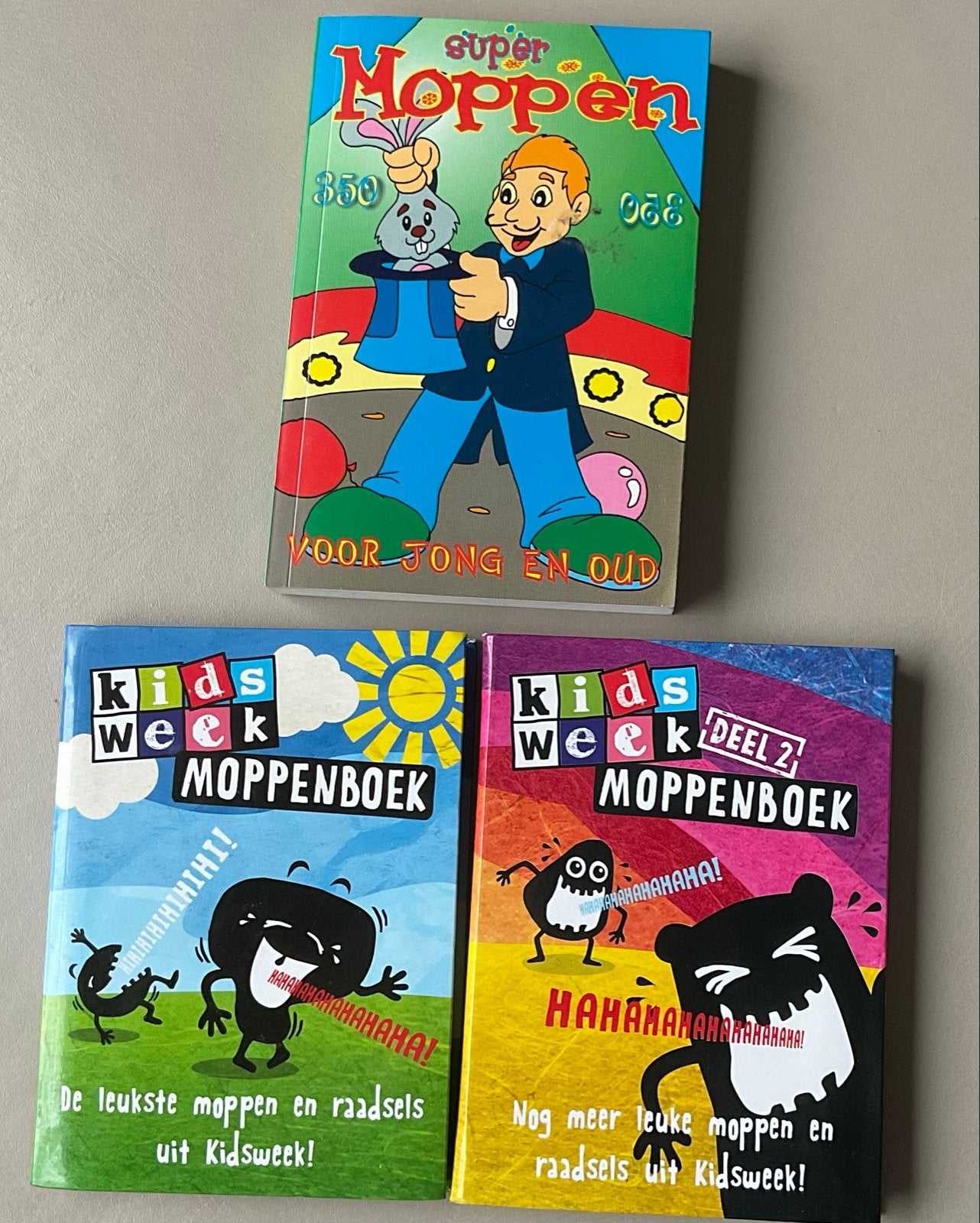 Moppenboeken: Super Moppen, Kidsweek Moppenboek Deel 1 & 2, Ophalen of Verzenden, Zo goed als nieuw, Moppen